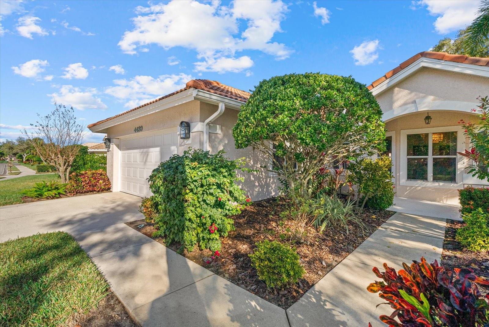 Just reduced $30,000 and Seller offering a $30,000 credit at closing. Seller is highly motivated.
Mesmerizing scenic lake views from this sought after Deer Creek Villa home located in the heart of Palmer Ranch. This Villa home offers close to 2,000 sq ft with enclosed Lanai with sliding doors to enjoy the warm breezes. Spacious rooms sizes, vaulted ceilings and lots of light in this 2-bedroom, 2-bath floor plan with large den/office. Lovely living room, dining room & white cabinetry kitchen with granite counters & decorative tile backsplash. Separate laundry room with cabinetry. Large Primary Suite with high ceilings & walk-in closet. The Primary Bath with granite double vanity, soaking tub & tiled shower. Split double bedroom & bath. The den/office could be a 3rd bedroom or exercise room. Deer Creek is one of the more established gated communities that offers residents gorgeous tree lined street, lush tropical flora & tranquil lakes. Deer Creek is a gated community with 24 hr. security that is low maintenance with a wonderful Community Pool & great social activities for all residents to enjoy. Close to everything in Sarasota, including top-rated schools, world-class golf courses, 8 miles to Downtown Sarasota, including Marie Selby Gardens. Shopping, all within 1 mile. Costco, Target, Sprouts, Starbucks, Kohls, the soon to be re-developed Sarasota Square Mall and a new Trader Joe's opening in Spring. The famous Legacy Trail is just a short distance away. Easy to schedule a showing.