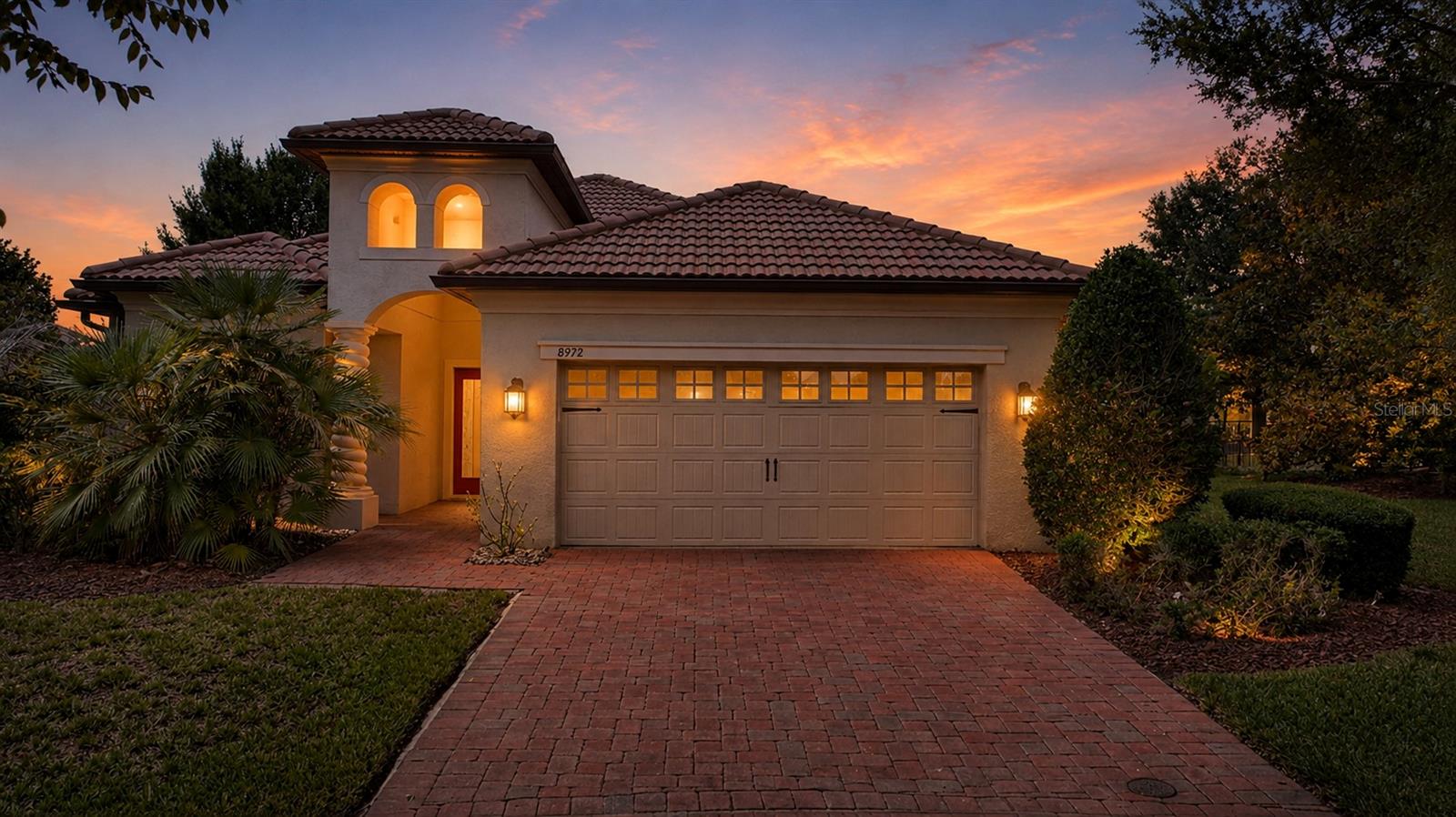 Virtually Staged. LIVE LIKE A CHAMPION! FULL GOLF MEMBERSHIP INCLUDED IN THE HOA! Perfectly positioned on one of the most sought-after homesites in ChampionsGate Country Club, this exceptional residence offers breathtaking golf course views, a premium cul-de-sac location, and is just steps from The Plaza clubhouse with its restaurant, bar, fitness center, pickleball courts, resort-style pools, and more. Overlooking the 14th tee box, the home enjoys a peaceful, open setting with spectacular south-facing views that can be enjoyed year-round.

Inside, you’ll immediately appreciate the extensive upgrades and meticulous care throughout. Designer tile flooring flows throughout the main living areas, while every bedroom features elevated designer carpeting for a luxurious finish. The gourmet kitchen is beautifully appointed with 42” solid wood cabinetry, striking leathered granite countertops, stainless steel appliances, and abundant workspace, creating the perfect setting for everyday living and entertaining.

What truly sets this home apart is the one-of-a-kind climate-controlled Florida room, adding approximately 300 square feet of heated and cooled living space not found in any other home in ChampionsGate Country Club. Flooded with natural light through walls of windows, this incredible space creates the perfect sunroom, second living area, reading room, or entertaining space while showcasing the stunning golf course views.

The spacious primary suite offers a relaxing retreat with a beautifully appointed en-suite bath featuring premium finishes, while the additional bathrooms continue the home’s upscale feel with high-end cabinetry, countertops, and fixtures throughout.

Additional peace of mind comes from a brand-new HVAC system installed in June 2026, providing years of efficient comfort.

As a resident of ChampionsGate Country Club, your HOA includes FULL GOLF MEMBERSHIP, cable, internet, lawn maintenance, and access to three incredible amenity centers. Enjoy the renowned Oasis Club featuring a resort-style pool, lazy river, waterslide, fitness center, movie theater, restaurant, tiki bar, and more. Country Club residents also enjoy exclusive access to The Plaza, offering two additional pools, pickleball courts, fitness center, restaurant, bar, and a $75 monthly food and beverage credit. You’ll also have access to The Retreat Club, completing one of Central Florida’s premier resort-style lifestyles.

This is a rare opportunity to own one of the most unique and beautifully upgraded homes in ChampionsGate Country Club, combining an unmatched location, one-of-a-kind additional living space, and luxury finishes throughout.