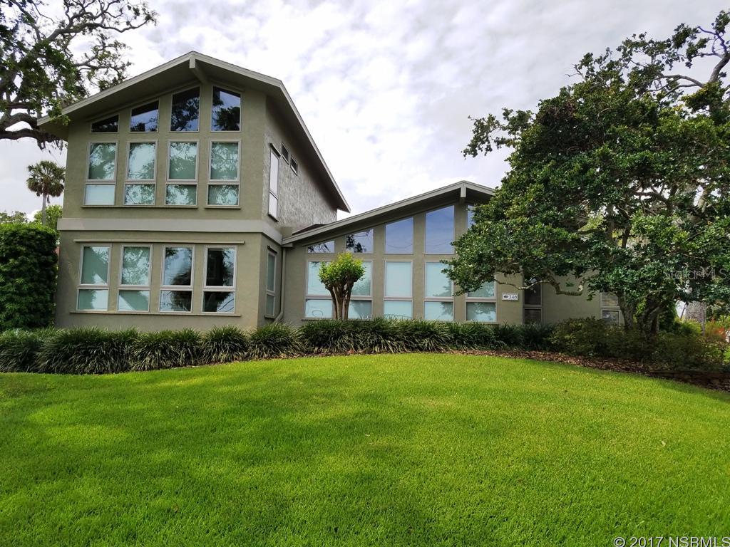 Panoramic Indian River views in this spacious triple split plan home. There is a full walk-in basement, whole house generator (2005) and detached 1500+ air conditioned garage; with full bathroom and second floor unfinished square footage. The .70 acre corner lot is beautifully landscaped, irrigated, with outdoor lighting and pavered driveway/patios. The inside of this lovely home boasts tongue and groove inlaid open beamed ceilings in the master bedroom and living room. The TV room has custom crafted cabinetry, oak paneling w/wet bar & mini fridge. The fireplace, hearth and entry steps are hand stacked Arkansas Ozark mountain stone. There is a central vacuum system and laundry chute from the master bathroom to the laundry just below. Many wonderful features for this gorgeous home. SPECTACULAR VIEWS! All measurements approximate. Owner is related to listing agent. ;Water: City