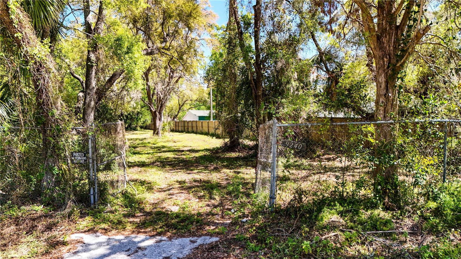Are you searching for a vacant 1+ acre property within New Port Richey?  Come to see what Bass Lake Acres has for you.  This property was made up of 3 parcels and combined to make a nice 1.55 piece of land ready for your vision.  The property has a 220 sq ft front entrance.  While the property is located within a subdivision; there is NO HOA or CDD fees and new single family homes are being built within to increase values.  This lot previously had a 1,400 sq ft home that has been removed (by permit) and the slab and foundation remain.  There is also a well onsite that has been capped and power is easily accessible.   This property is minutes to Lowes, Home Depot, shopping, restaurants, Pasco-Hernando State College and more!  Property is being sold AS IS and Buyer is to do their own due diligence.  Paving Assessment has been paid in full.  Zoned R-2 - which means you can subdivide this property to make several units.
