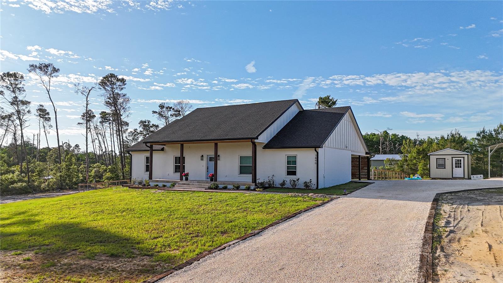 Welcome to this nearly new 2023 block home located in a desirable homes-only, deed-restricted community in Cedar Key! Offering 3 bedrooms, 2 bathrooms, and 1,912 square feet of living space (3,088 total under roof), this home blends quality construction with thoughtful design and modern finishes.

Step inside to an open-concept living, dining, and kitchen area featuring soaring 10’8” ceilings and durable luxury vinyl plank flooring throughout. The kitchen is designed for both function and style with white shaker cabinets, quartz countertops throughout, a spacious walk-in pantry with custom wood-stained shelving, and an impressive 8-foot island perfect for entertaining.

The primary suite is a true retreat, complete with a tray ceiling, oversized walk-in closet, and a luxurious ensuite bath featuring an 8-foot vanity with a linen cabinet and a custom tile walk-in shower. The guest bathroom is equally well-appointed with a custom tile tub/shower combination.

Additional interior features include a dedicated laundry room with tile floors, cabinetry, and built-in shelving for added convenience and storage.

Enjoy outdoor living on the screened-in porch overlooking a huge fenced backyard—ideal for pets, gatherings, or future additions. The home also features elegant travertine steps and front porch, a carport, and a gravel driveway all tied in together with beautiful landscaping. 

A standout feature is the 12x16 detached shop, fully finished with drywall, LVP flooring, and air conditioning—perfect for a home office, gym, or hobby space.

Located in Flood Zone X for added peace of mind, this property offers both comfort and convenience in a quiet Cedar Key setting.