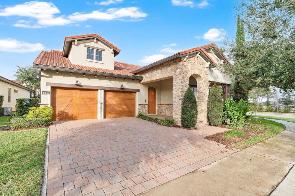Welcome to this stunning modern single-story home featuring a full CRESTRON Whole-Home Smart System, located in the highly sought-after Lakeshore Preserve community in Winter Garden. Built in 2017, this beautifully maintained residence offers approximately 2,092 square feet of living space situated on a 7,719 square foot lot.

Inside, you’ll find 3 spacious bedrooms, 2 full bathrooms, and an open-concept layout that seamlessly connects the living, dining, and kitchen areas — creating the perfect space for both everyday living and entertaining. The stylish kitchen is equipped with modern appliances, including a built-in oven, cooktop, dishwasher, and disposal, along with solid surface countertops designed for both function and style.

Additional upgrades and features include central heating and air conditioning, a tankless water heater, and an attached two-car garage. Residents of Lakeshore Preserve enjoy access to exceptional community amenities such as a clubhouse, resort-style pool, and recreational facilities.

Offering a move-in ready lifestyle in one of Winter Garden’s most desirable communities, 15607 Sylvester Palm Drive combines modern comfort, smart-home convenience, and the ease of single-level living.