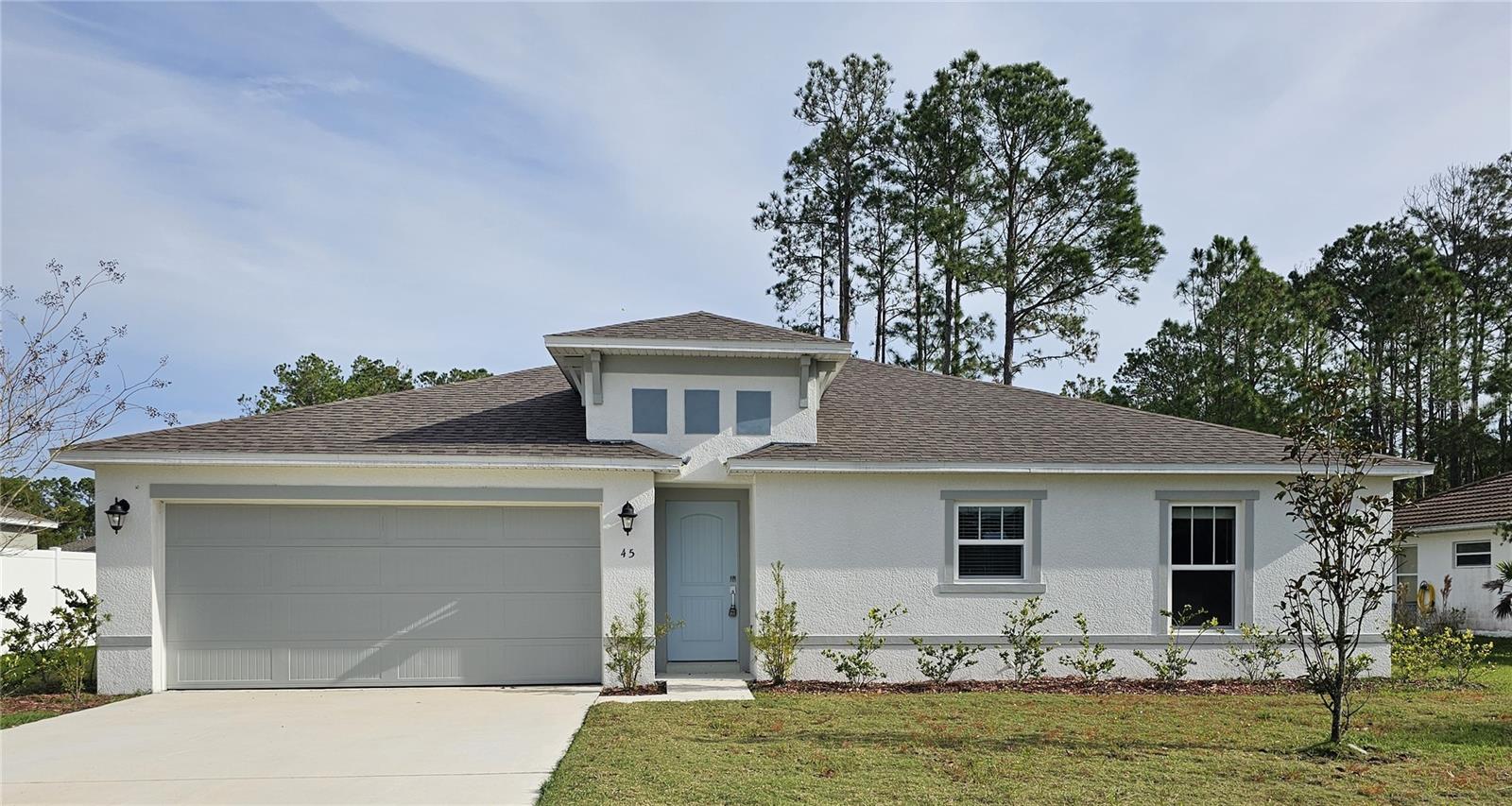 One or more photo(s) has been virtually staged. Welcome to 45 Rickenbacker Dr, located in the beautiful city of Palm Coast, FL. This stunning house offers a spacious floor plan with three bedrooms and two bathrooms, providing ample space for comfortable living. As you step inside, you'll be greeted by the modern touch of vinyl plank flooring, adding both style and durability to your home. The kitchen is equipped with sleek stainless steel appliances, perfect for culinary enthusiasts and those who love to entertain. The solid surface countertops not only provide a sleek and clean look but also offer durability for all your cooking needs. With its pet-friendly policy, this house ensures that your furry friends are welcome to join you in your new home. Whether you're looking to relax or entertain, 45 Rickenbacker Dr is the perfect place to call home. Don't miss out on this incredible opportunity to live in a beautiful house. Contact us today to schedule a tour and experience the comfort and convenience that this home has to offer.