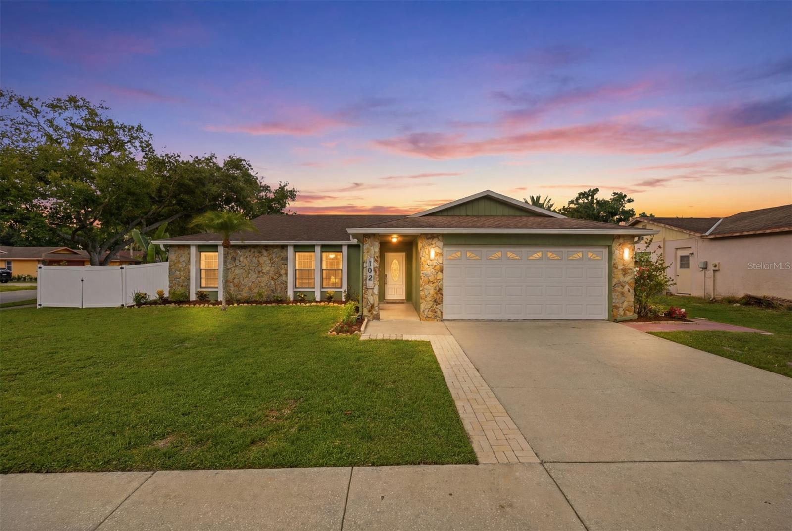Welcome to 102 Peacock Circle in charming Safety Harbor, located a quick golf cart ride to the picturesque downtown Safety Harbor area! Tucked away on a quiet cul-de-sac and situated on a desirable corner lot, this home offers beautiful curb appeal, lush landscaping, and a picturesque neighborhood setting that is hard to beat, with no flood insurance required! 

Inside, newer LVP floors and brand new interior paint welcome you, as well as an inviting open-concept layout designed for both everyday living and entertaining. The spacious kitchen centers the open living space and features newly redone solid wood cabinetry, stone countertops, an island with electric (Perfect for baking!), and double-stacked cabinets to the ceiling for extra storage. The living space surrounding the kitchen gives versatility in furniture layout and placement, depending on what your family's needs are at any given moment. Step outside of the sliding glass doors, and you can welcome yourself to your Florida Oasis! There is a large covered lanai area with electric, curtains, and enough space for a couch and table, which just extends the usable living space of this home. Beyond the lanai, you will find the sparkling pool and an amazing built-in Cabana! The cabana has been recently refreshed and updated, with most of the wood replaced and completely restained, for ease of maintenance! This entire area is screened in, but there is still room for ample side yards, perfect for pups, a playset, or a garden bed. The west side yard has a double gate, perfect for boat or RV storage. The landscaping, rock, and mulch were just redone, also ensuring that the home is truly move-in ready. 

Back inside, there are two generously sized guest bedrooms, sharing a fully updated full bathroom (Bathtub/Shower Combo) located just off the family room. The private primary suite is tucked away on the opposite side of the home, giving the house a true split floor plan. The spacious retreat has sliders leading out to the pool area, and the room is large enough for a king-sized bed, dressers, and if you need more storage, there's a large walk-in closet! The primary ensuite has been updated as well, giving the whole primary suite a true oasis feel. 

This home has been extensively updated, offering peace of mind for years to come. Improvements include new luxury vinyl plank flooring (2023), exterior paint and stucco repairs (2023), fresh interior paint and newly refinished cabinets (2026), new landscaping (2026), a 2023 water heater, 2023 washer, 2026 dryer, and an owned water softener that conveys (2023). The ductwork was replaced at the end of 2024, and the evaporator coil and TXV for the HVAC were replaced in May 2025. The pool subpanel was replaced in 2025, the filter and pump were replaced in 2024, pool screens have recently been serviced, and hardwired Ring security cameras convey with the home. HVAC was replaced in 2020, and the dimensional shingle roof was fully replaced in 2019. A full upgrades list is attached! This home is truly move-in ready, lovingly maintained, and ready for its new owner!