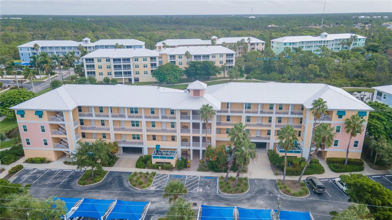 Cape Haze Resort!  Live like you are on vacation year-round!  BEAUTIFUL 2-BEDROOM, 2 BATH CONDO WITH 2 CAR GARAGE UNDER BUILDING AND A PRIVATE STORAGE ROOM.  Condo comes furnished and ready to enjoy with a relaxing pond view. Recent improvements include impact-resistant windows and doors installed 2024. New metal roof, 2024.  Cape Haze Resort is located 15 minutes from the beautiful beaches and town of Boca Grande.  Cape Haze Resort is located near golf courses, restaurants, area parks and so much more.  Right outside your door the resort features a heated pool, spa, fitness center, pickle ball/tennis courts, basketball court, putting green and social events.  Start living your Florida life today.  Schedule a showing. You will want to live here!