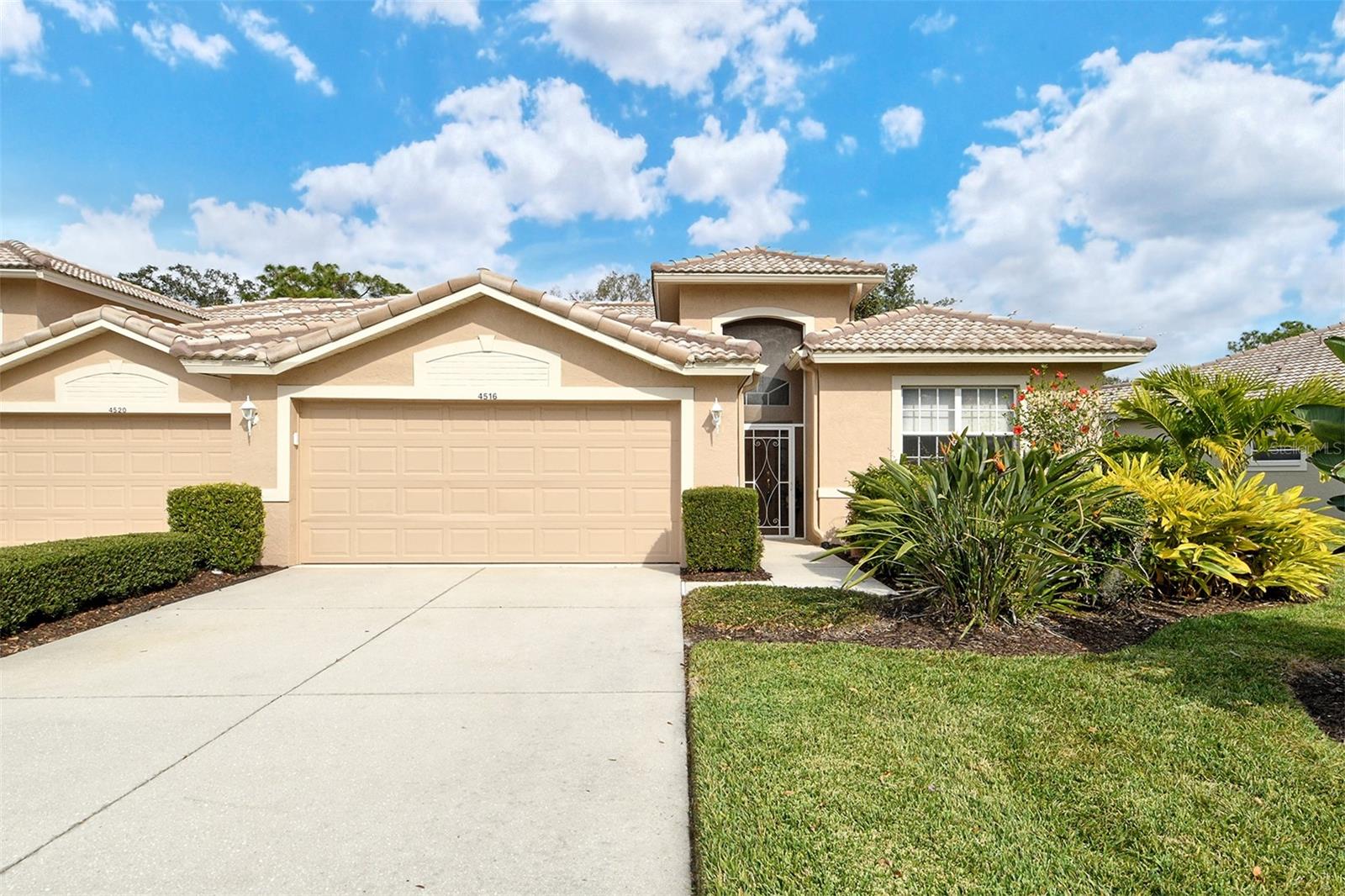 Welcome to Heritage Oaks Golf & Country Club! This wonderful "Innverness" model golf villa is the perfect amount of space for both full time owners or seasonal residents. Nestled in a private, less traveled part of the neighborhood and located directly across the street from one of the five heated pools in the community, this lovely property features 2 bedrooms, 2 bathrooms, a den/study that can double as a third bedroom and an attached two car garage. Designed with both everyday living and entertaining in mind, the home features an open and airy layout filled with natural light. Spacious living and dining areas flow seamlessly, providing plenty of room to gather with friends and family. Large windows and sliding glass doors connect the interior to the outdoors allowing you to fully appreciate Florida's indoor-outdoor lifestyle. The owner has just replaced the A/C (2025) giving the new owner years of worry-free living. The kitchen is thoughtfully designed with ample cabinetry, generous counter space, and a functional layout that makes cooking and hosting effortless. The primary suite provides a peaceful sanctuary, complete with abundant closet space and a well appointed en-suite bath. One additional bedroom and a den/study provide flexibility for guests ensuring the home can expand when guests come to visit. Step onto the rear lanai and enjoy the oversized screened area with gorgeous, private views of preserves and nature. Enjoy time with a coffee in the morning and watch the abundance of wildlife that roam this Certified Audubon Neighborhood. Heritage Oaks is known for its pristine 18-hole golf course, har-tru tennis courts, fitness center, 24-hour security, an impressive clubhouse with 2 restaurants including the sensational 19th Hole Lounge, 5 heated swimming pools, and a calendar of events packed with activities. Are you ready to call Heritage Oaks home?