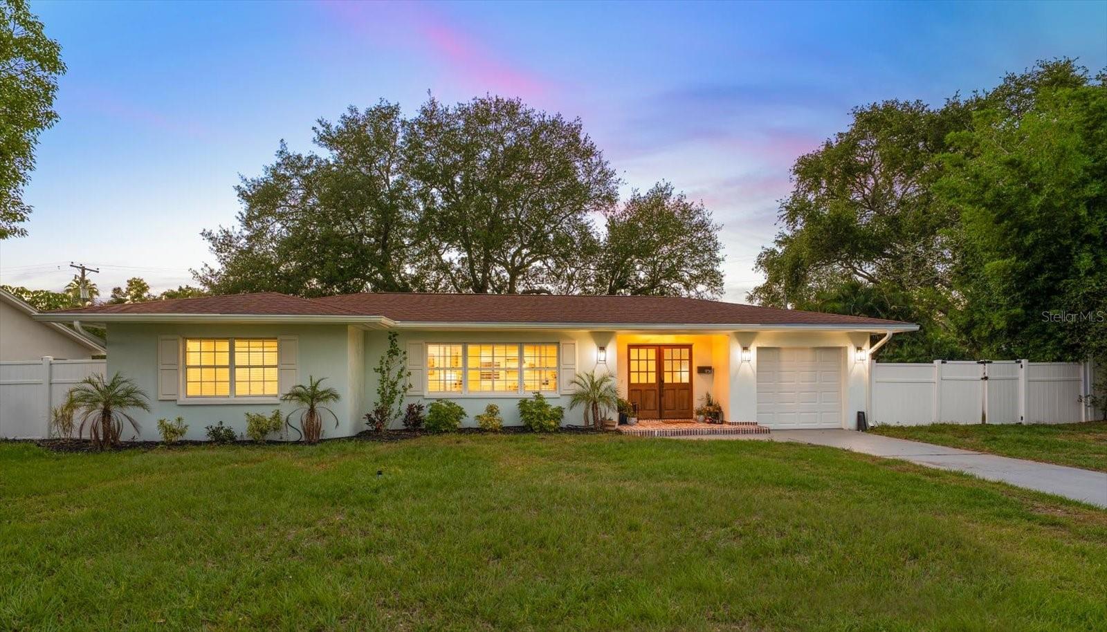 Perfectly located in the sought-after Town of Belleair, this beautifully renovated and move-in
ready home offers the perfect blend of style, comfort, and location. From the moment you
arrive, the brick-paved entryway and impressive double entry doors create a warm and elegant
welcome. Step inside to discover a bright, open-concept interior filled with natural light and
designed for effortless everyday living and entertaining. The stunning white kitchen serves as
the heart of the home, featuring an oversized island with seating, stainless steel appliances,
abundant cabinetry, open shelving and seamless flow into the spacious living and dining areas.
Sliders open to a paved patio and private backyard oasis, creating the ideal indoor-outdoor
lifestyle Florida living is known for. The thoughtfully designed split-bedroom floor plan offers
privacy and functionality, highlighted by a spacious primary suite complete with a walk-in
closet and private sliders leading to the backyard retreat. The luxurious ensuite bath showcases
a large custom-tiled walk-in shower and elegant double sink vanity. Additional bedrooms are
generously sized, filled with natural light, and offer plentiful closet space while sharing a
beautifully updated hall bath featuring a furniture-inspired double sink vanity, tub/shower
combination, and convenient backyard access. An indoor laundry room and half bath add to the
functionality of the home. Perfectly positioned near local restaurants, boutique shopping, two
private golf clubs, and the area’s famous white sand beaches, this exceptional property offers
the rare opportunity to enjoy the very best of Belleair living. Thoughtfully updated with newer HVAC, ductwork, electrical, plumbing, impact sliders, LVP flooring, refreshed landscaping & more. An exceptional find in today’s
market, this stunning home is sure to capture attention and won’t last long.