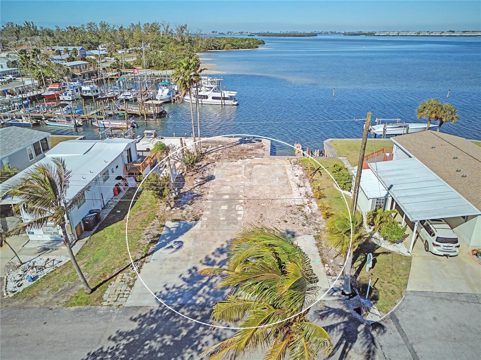 RARE WATERFRONT OPPORTUNITY in Sunny Shores that is now allowing you to LIVE in your RV or place a new mobile home on a fully cleared lot with stunning water views.
This is one of the most affordable waterview lots in Manatee County and comes with something you rarely find: you own the land with NO HOA, NO Lot Rent, NO Age Restrictions, NO Deed Restrictions and NO Pet Restrictions. A private boat slip is also included with the property, making this an ideal setup for true coastal living.
Enjoy peaceful water views and a laid-back Florida lifestyle in a welcoming coastal community. Residents of Sunny Shores have access to a waterfront community park on Palma Sola Bay, with optional clubhouse and shuffleboard amenities available for a small annual fee—perfect for gathering with neighbors and enjoying the sunshine.
Perfectly located just minutes from historic Cortez Village, the beaches of Anna Maria Island, and all the shopping, dining, and conveniences of Northwest Bradenton. Whether you’re looking for a seasonal getaway or a full-time coastal residence, this location delivers both lifestyle and value.
Bring your vision, drive your RV onto the lot or build your ideal Florida retreat in one of the most flexible waterfront communities around.