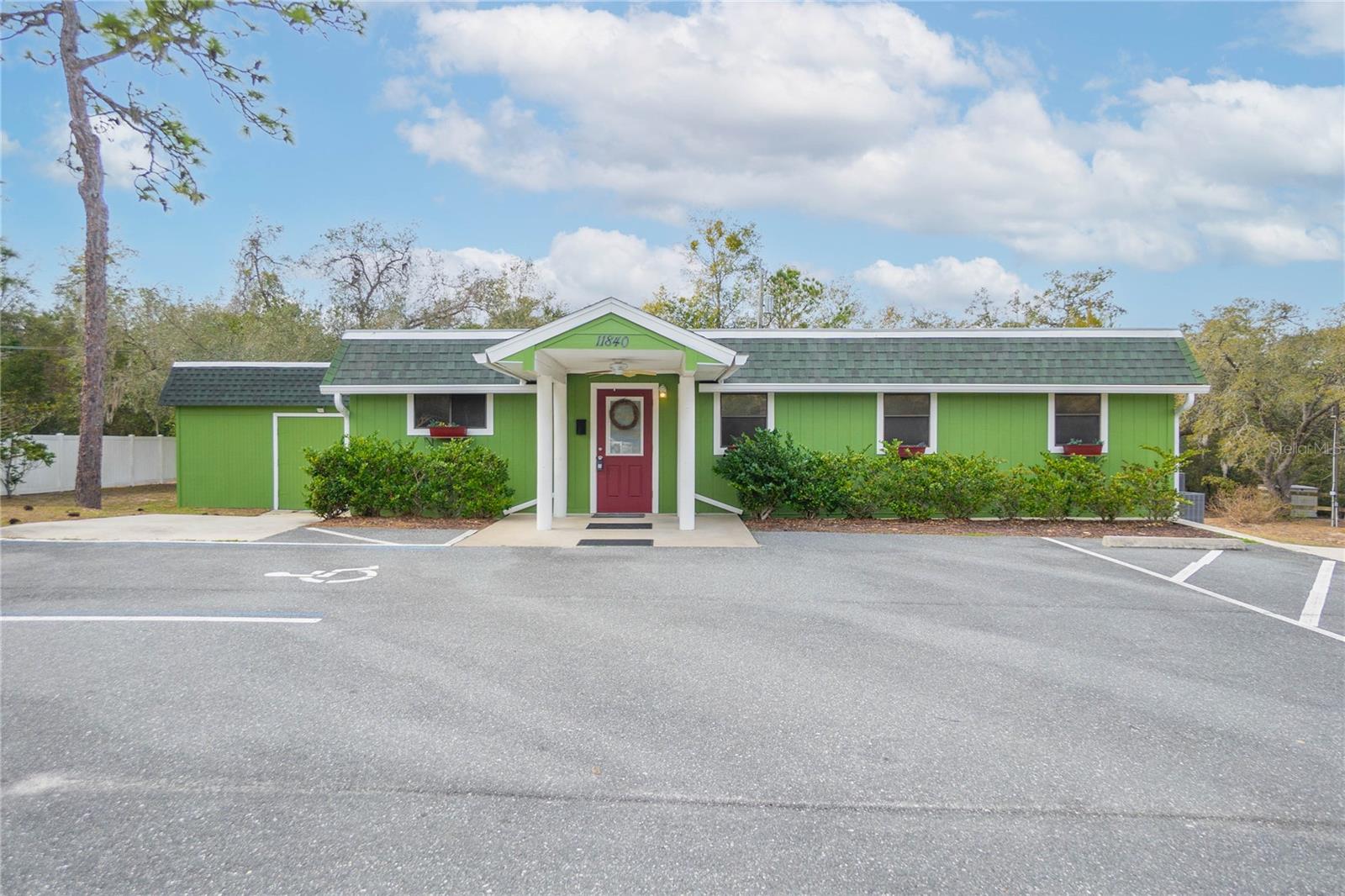 Nice clean versatile building with 5 office spaces and a partial kitchen, half bath and a conference room, Detached oversized climate controlled garage too! Location is mere minutes from downtown Dunnellon. Private well and septic allow for affordable utilities. This would be an ideal spot for a Real Estate office, professional office space, day spa, hairdressers shop or more!! The possibilities are endless! Move in ready...come see this one!