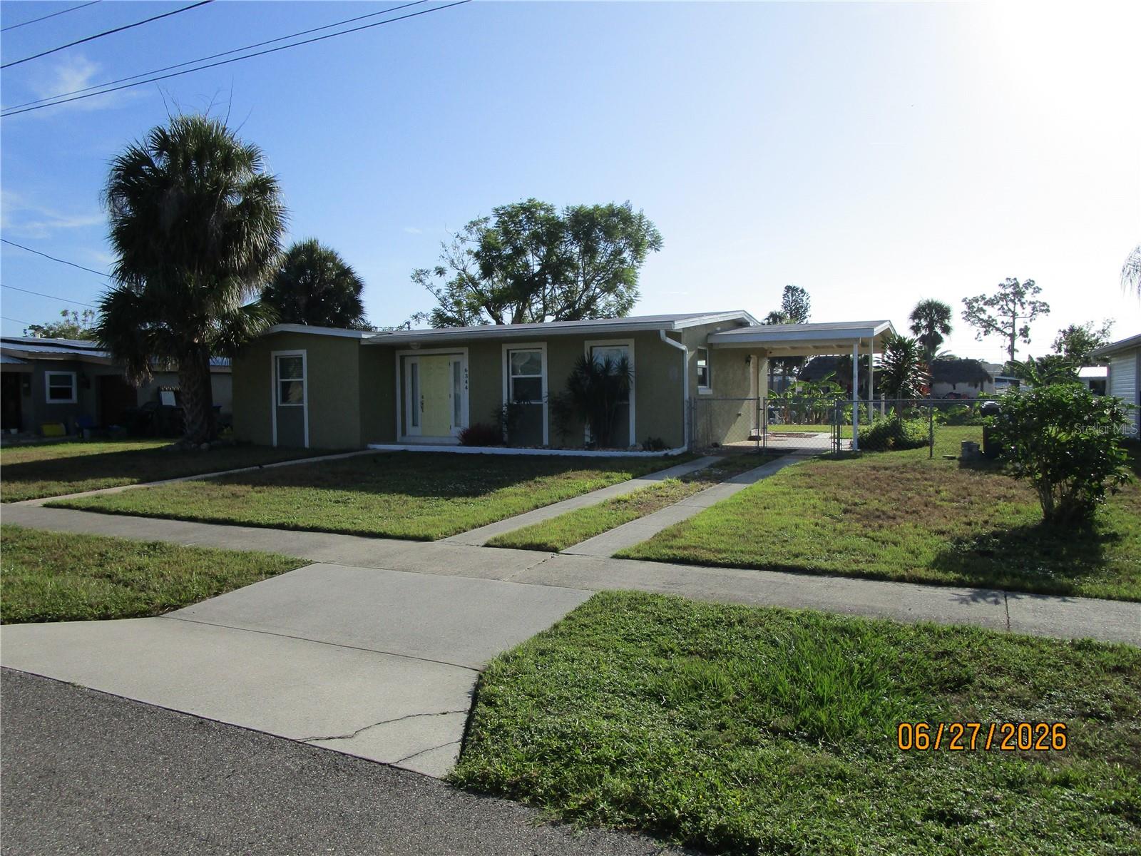 Annual Rental – $1,900/month + Utilities
Enjoy peaceful Florida living in this charming 2-bedroom, 2-bath canal-front home located on a quiet, low-traffic street that ends in a cul-de-sac. Thoughtfully updated and meticulously maintained, this home features an open floor plan, polished terrazzo floors, updated kitchen and bathrooms, a built-in office/workspace with additional storage, and a brand-new stainless steel appliance package.
Relax on the screened lanai overlooking the peaceful canal, or enjoy the privacy of the fenced backyard. The attached carport adds everyday convenience, and the home is available partially furnished or unfurnished to fit your needs.
Conveniently located near shopping, restaurants, golf, parks, and everyday amenities, this home offers comfort, character, and a peaceful setting.

$1,900 a month plus utilities. Annual lease. First month's rent, last month's rent, and security deposit required. Dogs considered with owner approval.