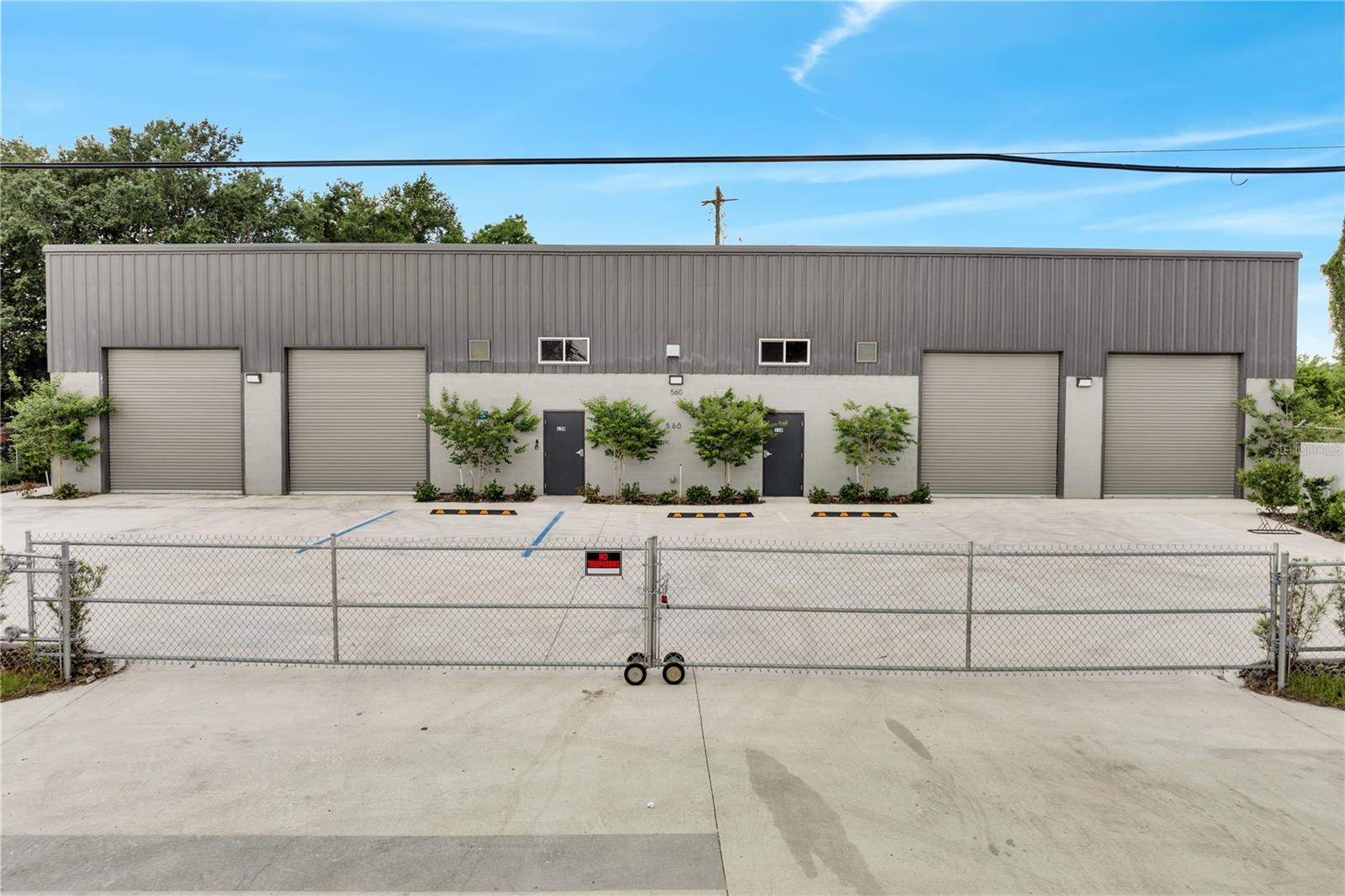 This top-tier commercial warehouse is centrally located in Orlando and built for both flexibility and efficient operations. The property features 5,678 square feet of warehouse space and 693 square feet allocated for offices. It can be split into two units, each equipped with its own air-conditioned office, bathroom, and roll-up door—making it perfect for rental options or dual tenants. Ceiling heights range from 18 to 20 feet, which allows for plenty of vertical storage and adaptability. The facility includes Three-Phase Power, providing strong electrical support for various industrial and commercial uses. Security is enhanced by fencing and gated access. With convenient proximity to Highway 50 and quick routes to SR408, Florida's Turnpike, and Interstate 4, this C-3 zoned property is well-suited for businesses prioritizing efficiency, safety, and flexibility. Don't miss the chance to secure this prime warehouse location.