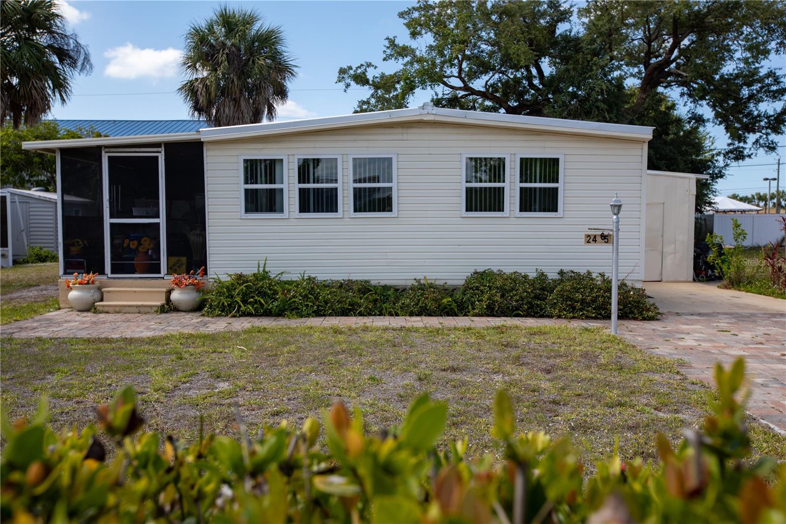 Cute as a button.This recently  updated manufactured home is ready to move in today. All this is situated conveniently right in the middle of all the fine amenities and  beautiful beaches, awesome dining experiences in highly sought after Englewood Florida  This home is located in a 55+ community with a voluntary HOA, which gives you access to the clubhouse and to the boat launch to launch your boat into a nice canal and onto  the intercoastal waterway and the Gulf of America. Very easy to show on two hours notice
