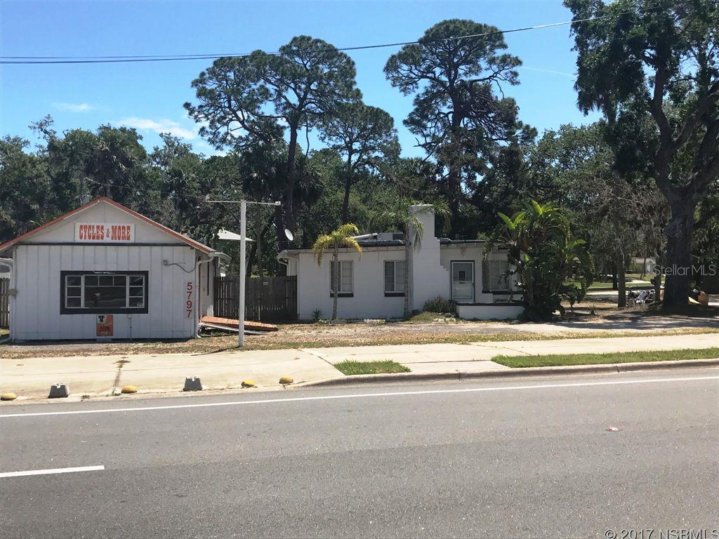 Perfect for small business with living quarters or redevelopment.  Hi traffic area with 147 feet of canal frontage in the back of the property.