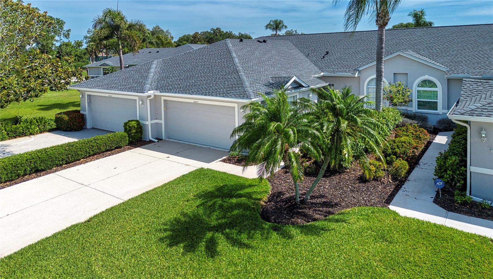 Not just another lovely home on a street, this "Buttonwood" Club Home, former builder's model, is ready for the opportunity to make it your own. With classic design and fully furnished, the home is waiting for the right touch.  The kitchen is spacious and conveniently designed, with granite countertops.  The Breakfast Nook has a buffet server with overhead lighting and extra cabinet space. Washer/dryer laundry room is in a separate utility room, conveniently adjacent to the kitchen.   The den has a built-in entertainment center and an integrated desk/computer work space.   The Primary bedroom is more spacious due to the optional bay window which overlooks the water and the golf course.  The en-suite bath has double sinks, a step-in shower and an enormous walk-in closet.  
Situated on a semi private street, in proximity to the tennis courts, Pro Shop, Jr. Olympic pool and spa, and the main clubhouse with the 19th Hole, dining rooms and meeting rooms.  Through the breezeway takes you to the newly renovated fitness center, complete with first class fitness equipment and a full-time director and specialty adjunct instructors. All conveniently located and accessible to your new home. In fact, one of the neighborhood pools is located in the other direction and about the same distance.
Heritage Oaks Golf and Country Club is a bundled community (all owners are members of the club and enjoy access to the amenities) situated on 550 acres, five miles of walking trails, four neighborhood pools, gated with a 24-hour guard on duty.
Sarasota is "The Arts Capital of Florida, and as such, has many cultural and artistic venues: restaurants, world class beaches, Selby Gardens, Mote Marine St. Armand's Circle and the three convenient airports. Come and enjoy the Heritage Oaks Lifestyle in Sunny Sarasota.