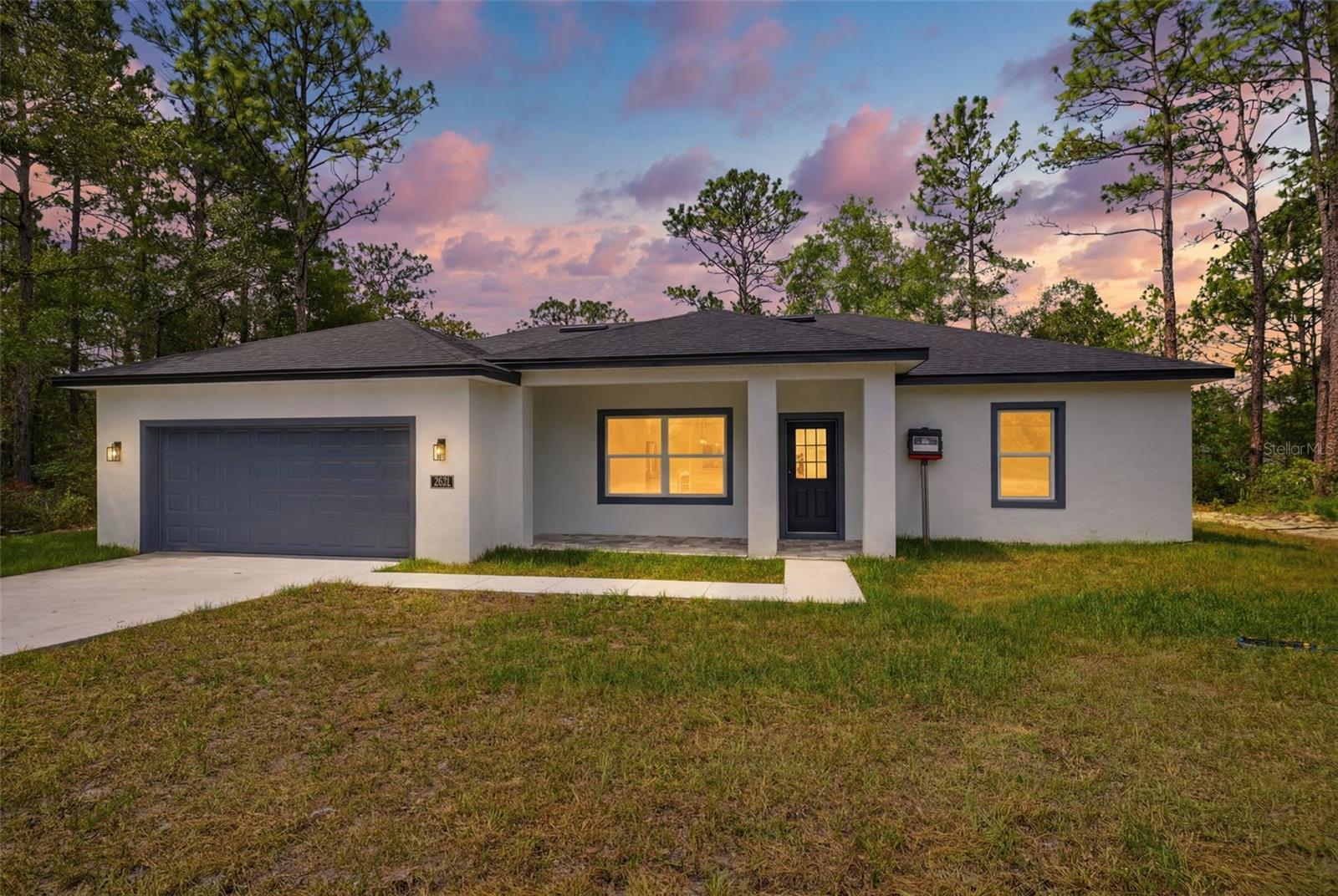 Prime Citrus Springs Location

Brand-new construction featuring 3 bedrooms, 2 bathrooms, and modern design in the heart of Citrus Springs. This move-in-ready home combines style, comfort, and functionality with an open-concept layout designed for today's lifestyle. The spacious primary suite offers a large walk-in closet, while the two additional bedrooms include built-in closets for excellent storage and organization.

The bright living and dining areas flow seamlessly into a beautifully appointed kitchen featuring solid wood cabinetry, elegant quartz countertops, premium appliances, and abundant workspace, creating the perfect setting for everyday living and entertaining. Every detail has been thoughtfully selected to deliver both beauty and practicality.
Conveniently located near major roadways for easy commuting, this home is also close to highly rated schools, shopping, dining, outdoor recreation, and everyday conveniences.

Enjoy the benefits of owning a brand-new home in one of Citrus Springs' most desirable areas. Offering modern finishes, quality craftsmanship, and a functional floor plan, this exceptional property is ready for its first owner to move in and start making lasting memories.