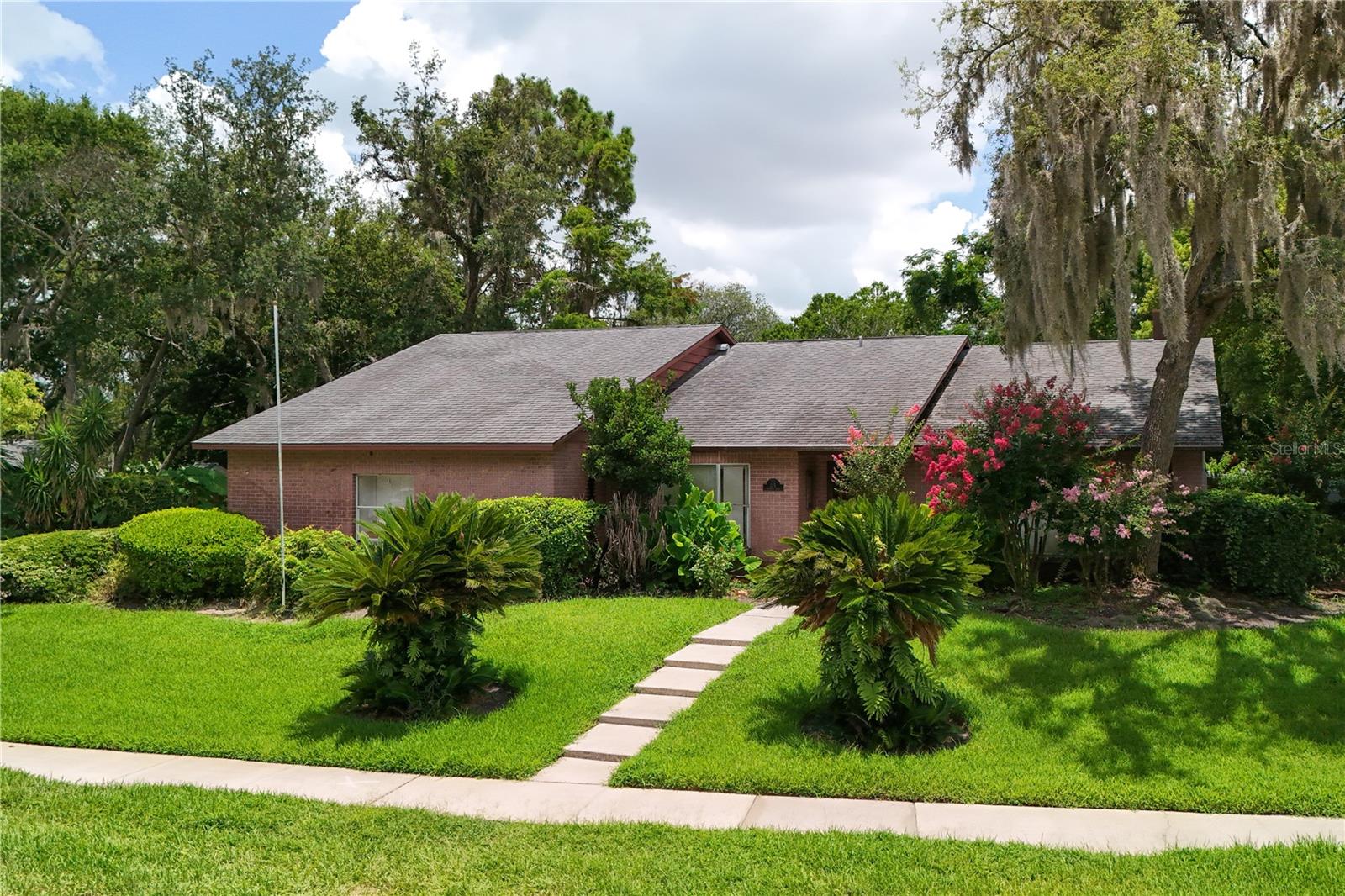 Welcome home to this lovely 3-bedroom, 2-bath residence with an oversized side-entry 2-car garage in the desirable Kaywood community. Enjoy Florida living at its finest with sliding glass doors opening to a beautiful screened-in pool overlooking a generous 0.35-acre lot—perfect for relaxing or entertaining. Rich wood-look laminate flooring offers both style and easy maintenance throughout the main living areas. The spacious kitchen features abundant cabinetry and generous counter space, making meal preparation a breeze. Well-sized secondary bedrooms provide plenty of room for family, guests, or a home office. Conveniently located with easy access to I-4 and SR 417. This home is also zoned for some of Seminole County's top-rated schools. Don't miss this wonderful opportunity to own a home in a fantastic location!