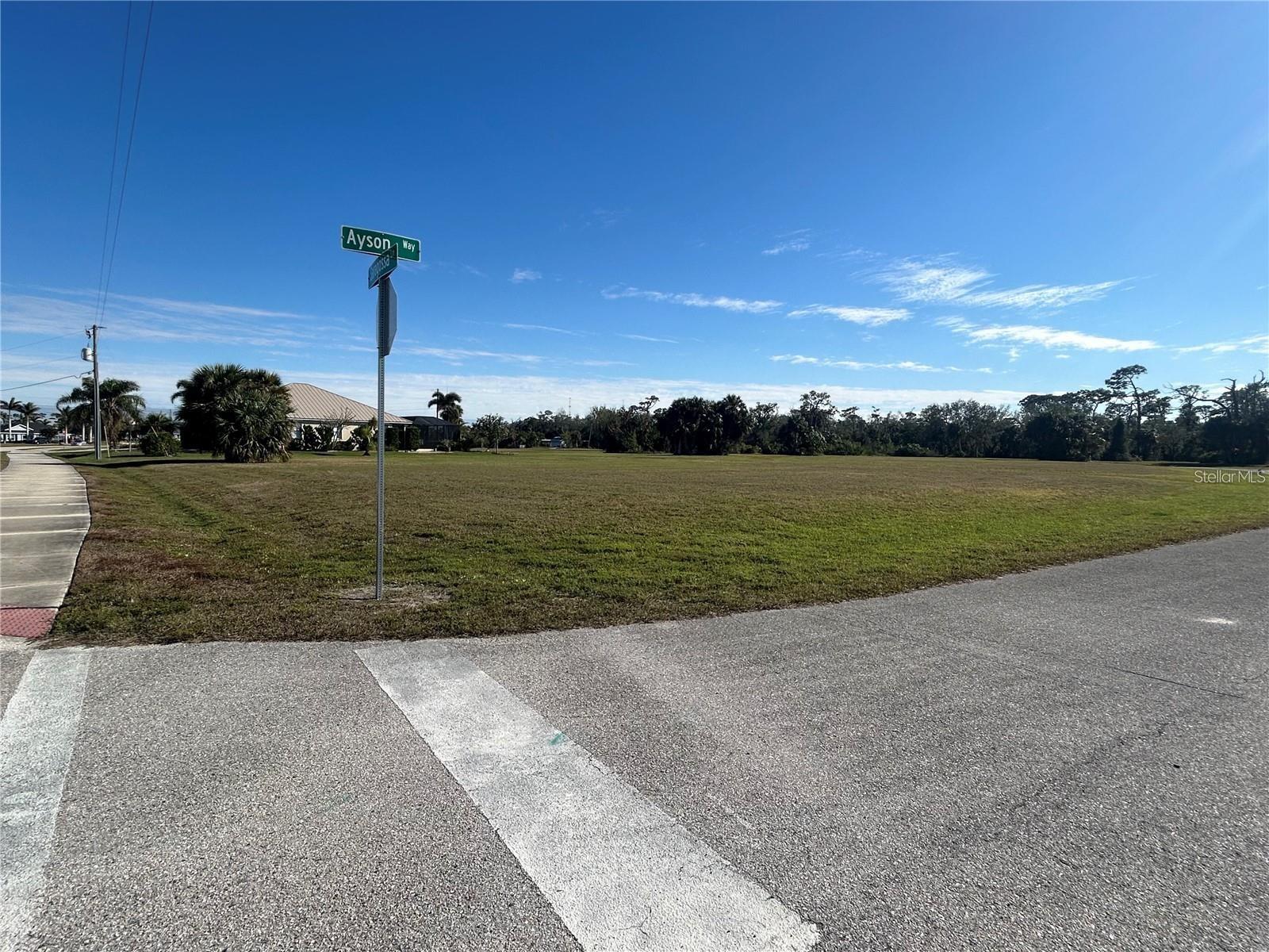Build Your Dream Home in beautiful Burnt Store Lakes! Nestled on a peaceful corner in a quiet cul-de-sac, this prime lot offers the perfect opportunity to build your Florida home. Located in the highly desirable Burnt Store Lakes community, you'll enjoy the benefits of a beautiful neighborhood with low yearly HOA fees, walking paths, a park, and lakes full of fish. You're right next door to Burnt Store Marina where you'll find an 18 hole golf course, a full boat marina with access to open water and boat storage for a small fee.  There's also two water side restaurants open to the public.  You've got quick access to Burnt Store Rd, which can take you to either Punta Gorda or South to Cape Coral and Ft Myers! Imagine waking up to scenic surroundings and spending your days exploring the tranquil waters, thanks to the community kayak and canoe launch. Take a leisurely stroll along the walking paths or unwind in the community park area by the water, where you can relax in the pavilions, entertain friends, or simply enjoy the natural beauty of Florida's outdoors. Whether you're looking for a serene retreat or an active lifestyle, this lot provides the ideal location for your future home.  Seller has a survey and site plan available on request, as well as a relationship with a local trusted builder!  It's a great time to buy property in this community!!