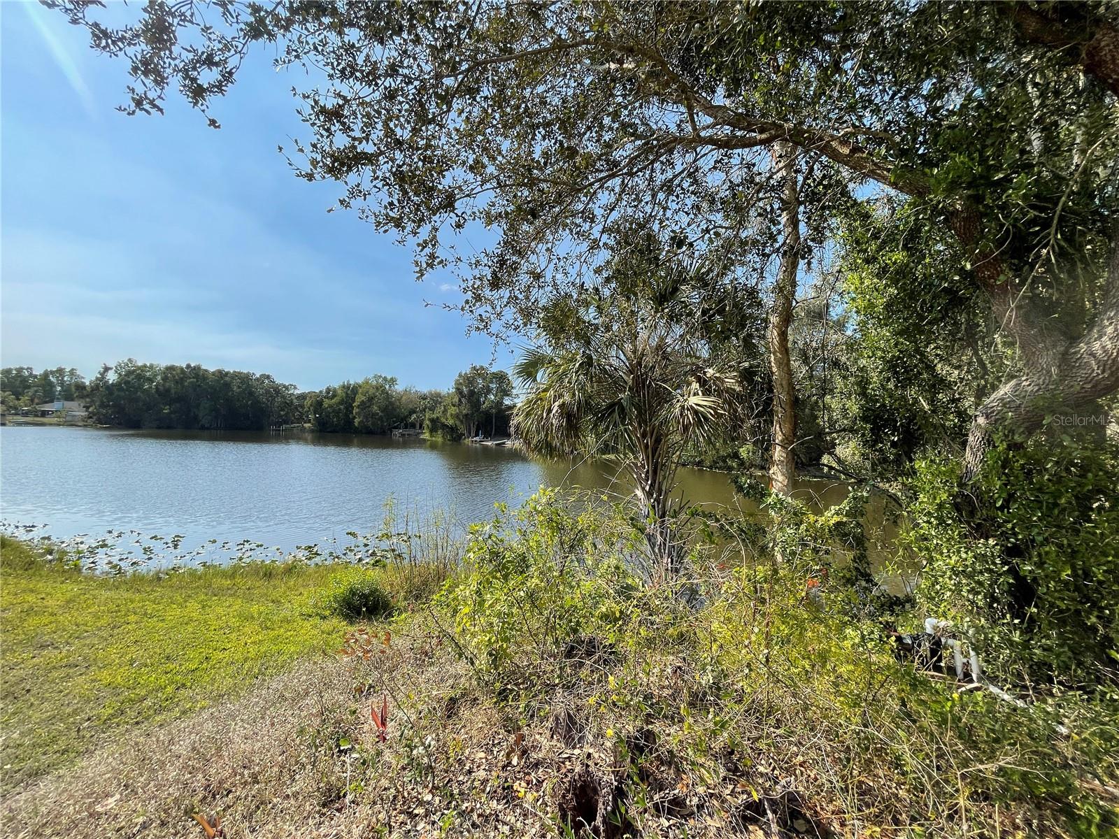 Beautiful lakefront, buildable lot located in the peaceful and scenic community of Tropical Gulf Acres. Ideally situated near I-75 and Punta Gorda Airport, offering convenient access between Fort Myers and Sarasota. Enjoy nearby Fishermen’s Village in Punta Gorda, featuring waterfront dining, shopping, and entertainment. Area amenities include bike trails, walking paths, and public boat ramps providing quick access to Charlotte Harbor and the Gulf. A great opportunity to build your dream home in a quiet yet centrally located neighborhood.