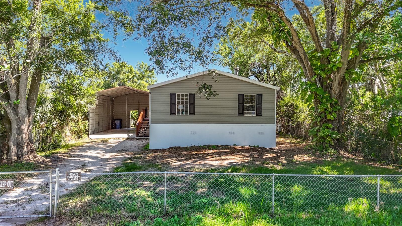 Must see this great deal! This fully remodeled 4 bedroom, 2 bath home on just shy of a quarter acre lot offers 1,872 sq. ft. of beautifully updated living space, delivering the perfect blend of modern upgrades, privacy, and space. Recent improvements include a brand-new AC, newer roof (2022), fresh interior and exterior paint, and new laminate wood flooring throughout. The open-concept floor plan features a completely renovated kitchen with stainless steel appliances, quartz countertops, and all new cabinetry, ideal for entertaining and everyday living. Both bathrooms have been fully updated with new shower enclosures, fixtures, finishes, and lighting. The spacious master bedroom offers an additional space that could be used for an office, seating/lounge area or baby's nursery in addition to the attached master bathroom featuring a walk-in shower, a brand-new corner soaking tub, and a walk-in closet. Exterior features include an RV/Semi truck carport, a shed and a fully fenced yard. There is no Homeowners Association or deed restrictions to deal with. Conveniently located close to shopping and dining. Ideal for buyers seeking space, and modern finishes, this property checks all the boxes.