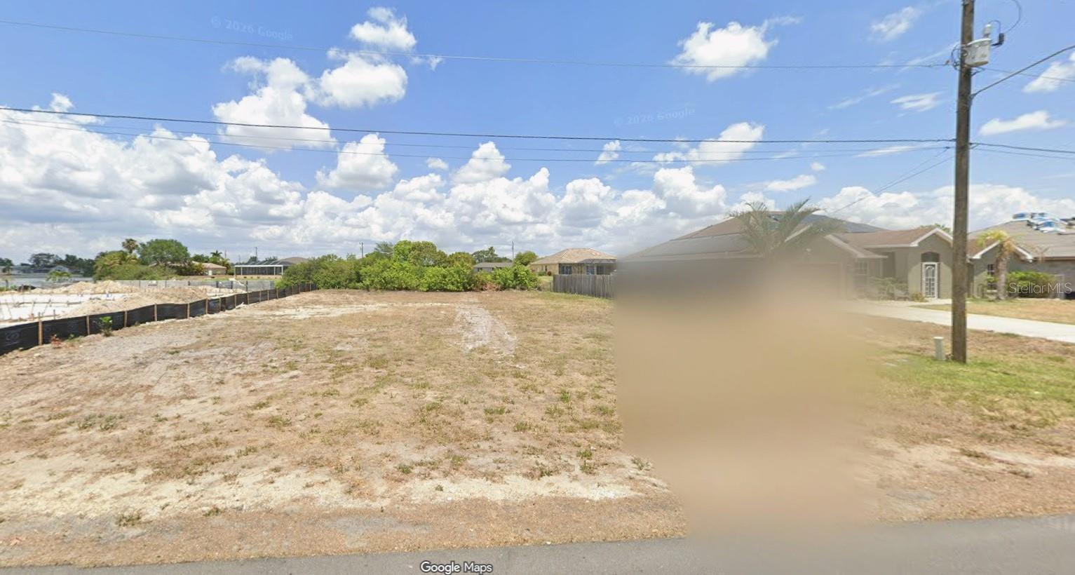Build your dream home on this exceptional freshwater lot in one of Cape Coral's fastest-growing areas! This prime homesite offers the added value of approximately $23,000 in completed city water and sewer improvements, saving future owners significant time and expense. Surrounded by newer homes and ongoing development, this property provides an excellent opportunity for builders, investors, or anyone looking to create their custom Florida retreat.

Enjoy the peaceful setting while remaining conveniently located near shopping, dining, schools, parks, and major roadways. With Cape Coral continuing to experience strong growth and demand, vacant lots with utility improvements already in place are becoming increasingly desirable.

Don't miss this opportunity to secure a premium homesite in a thriving neighborhood with substantial infrastructure value already invested. Verify utility assessment status and building requirements with the City of Cape Coral.