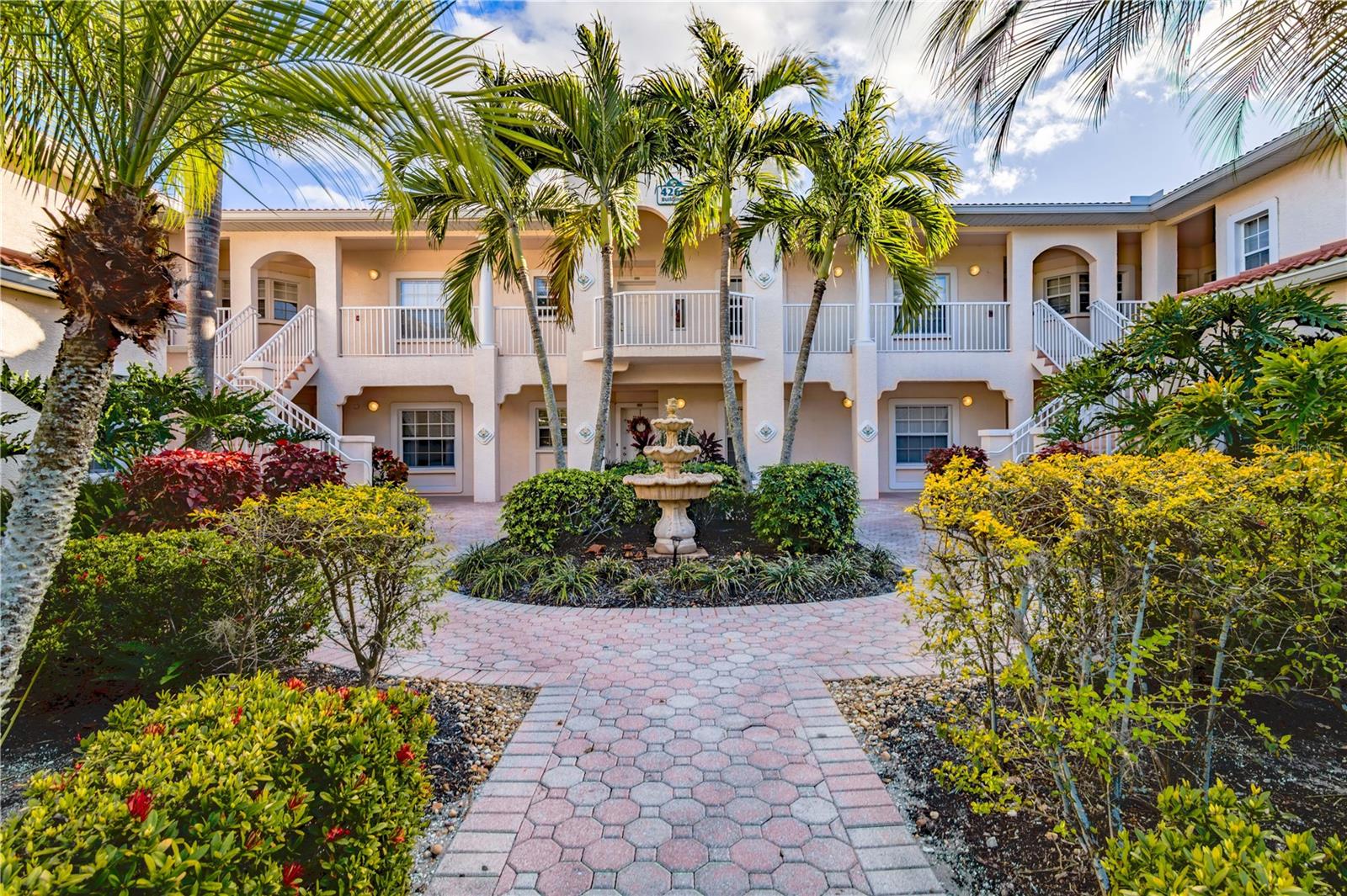 Welcome to one of Plaza De Flores’ most desirable opportunities - a beautifully renovated, rarely available corner-unit condo in a gated Palmer Ranch community. This light-filled and spacious 3-bedroom, 2-bath corner residence offers the perfect blend of comfort, style, and convenience. Thoughtfully updated throughout, the home features impact windows and sliders, an expansive private lanai ideal for relaxing or entertaining, and a bright open-concept layout designed for easy Florida living. The fully renovated kitchen is a standout, complete with high-end stainless-steel appliances, built-in oven and microwave, abundant cabinetry, and easy-care countertops. Both bathrooms have been beautifully updated with tiled walk-in showers and upscale fixtures, creating a clean, modern feel. Additional recent upgrades provide exceptional value and peace of mind, including a newly front-load washer and dryer (2022), newly HVAC system with transferable 10-year parts and labor warranty (2022), new roof (2023), and new installed natural wood floors (2025). A brand-new covered carport and fresh paving, completed in 2025, add even more convenience. New all hurricane proof windows across entire property with life time guarantee (2024). The condo fee includes cable, water, sewer, and trash, making ownership simple and economical. Located just steps from the clubhouse, resort-style pool, fitness center, and tennis courts, this unit offers one of the most convenient locations in the community. Even better, shopping and dining are right at your doorstep, with exciting new nearby development around Sarasota Square Mall, including Whole Foods, CAVA, Chipotle, Joe & The Juice, and Trader Joe’s across the street. Ideally situated in the heart of Palmer Ranch, you’ll be minutes from Siesta Key Beach, downtown Sarasota, marinas, and The Legacy Trail. Move-in ready, beautifully updated, and perfectly located - this is Florida living at its best!