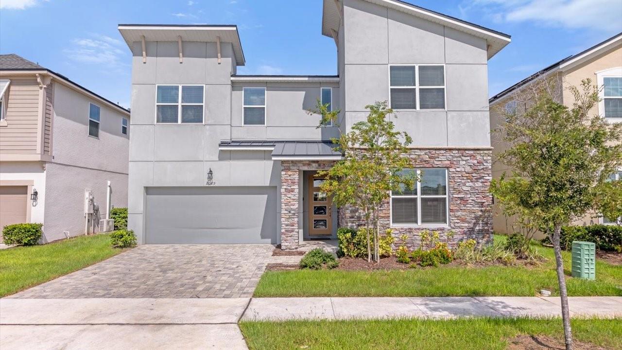 Experience the perfect blend of luxury, lifestyle, and investment potential at 2089 Tropical Palms Circle, an exceptional residence in the sought-after Solara Resort, just minutes from Walt Disney World, Margaritaville, ChampionsGate, world-class golf, shopping, dining, and convenient access to US-192 and SR 429. Designed with both comfort and entertaining in mind, this spacious home showcases an open-concept floor plan filled with natural light, a chef-inspired kitchen featuring premium cabinetry, stone countertops, stainless steel appliances, and generous gathering spaces that flow seamlessly to the private outdoor oasis. Beautifully appointed bedrooms, thoughtfully designed living areas, and professionally inspired décor create an inviting retreat for family and guests alike, while the screened private pool and covered lanai offer the ultimate Florida indoor-outdoor lifestyle. Residents and vacation guests enjoy access to Solara Resort’s outstanding amenities, including a grand clubhouse, resort-style pool, splash park, FlowRider® surf simulator, fitness center, sports courts, playgrounds, on-site dining, and 24-hour gated security, making this an outstanding opportunity as a luxury vacation home, income-producing short-term rental, or unforgettable family getaway in one of Central Florida’s premier resort communities.