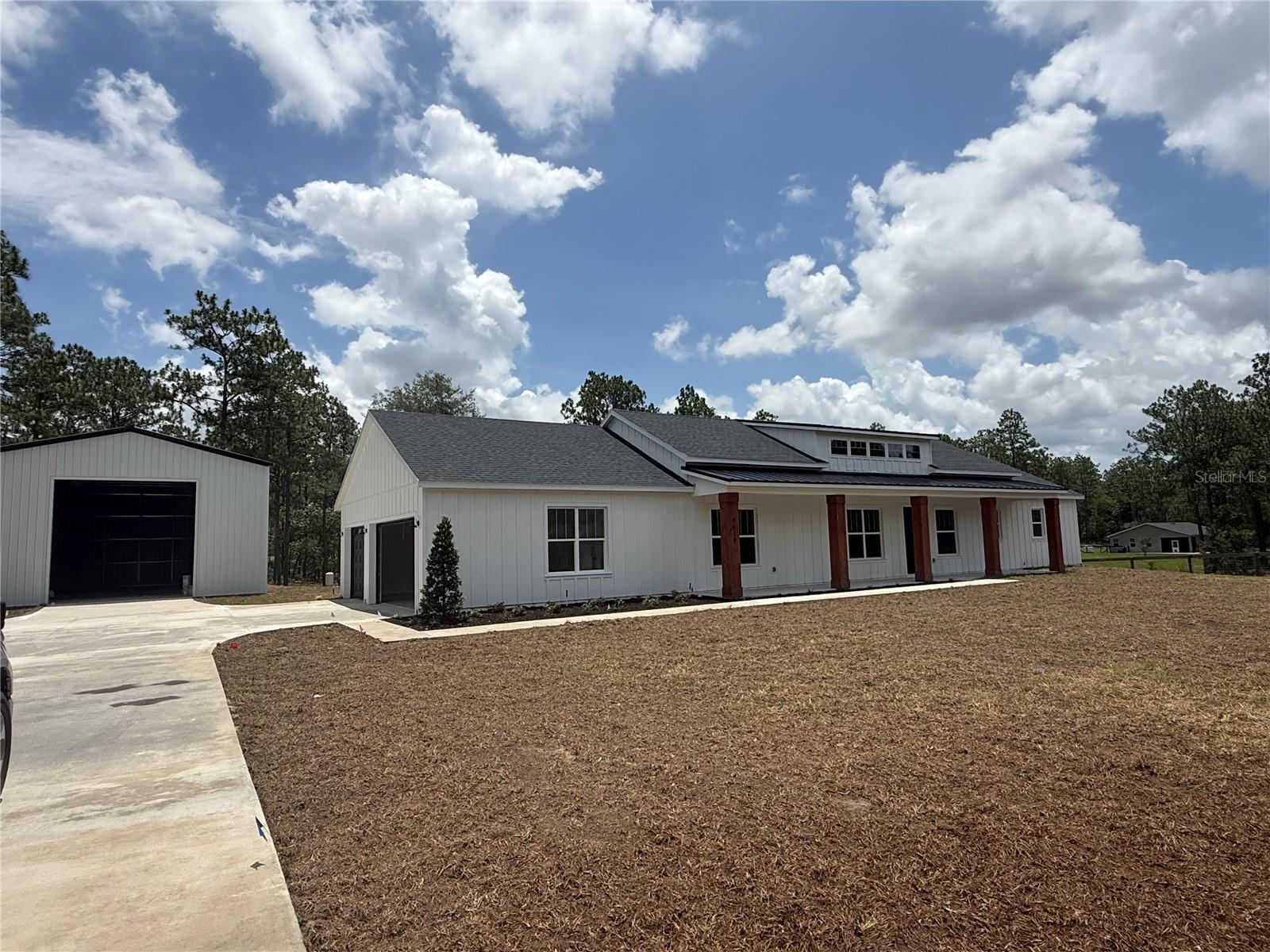 Custom-Built. Acre-Plus. Shop Big Enough to Actually Use.
This isn’t a builder-grade box dropped on a lot. It’s a true custom build by Brije Custom Homes, 2025 Builder of the Year and Featured Builder for the 2026 Parade of Homes. Four bedrooms, three full baths, sitting on more than an acre with room to breathe and zero HOA babysitting your weekend projects.
The split-bedroom layout puts the primary suite on its own end of the home with a designer-curated bath and walk-in closet built for the way people actually live. The kitchen opens straight into the great room under tall ceilings that pulls in natural light from every angle, the kind of detail that doesn’t happen by accident.
Now the garage situation. Three-car attached garage for the daily drivers. Then walk out back to a 50x30 detached shop with a 14-foot garage door, which translates to: park the RV, pull in the boat, build the woodshop, run the side business, store the toys. Whatever your version of “finally have the space for it” looks like, this is it.
Every Brije build runs through our in-house designer, so the finishes, fixtures, and flow are intentional from day one. 
Properties with this much usable acreage, this level of build quality, and a shop this size don’t sit long in Marion County. Home to be completed end of May. Professional photos will be available than but dont wait to see this home.