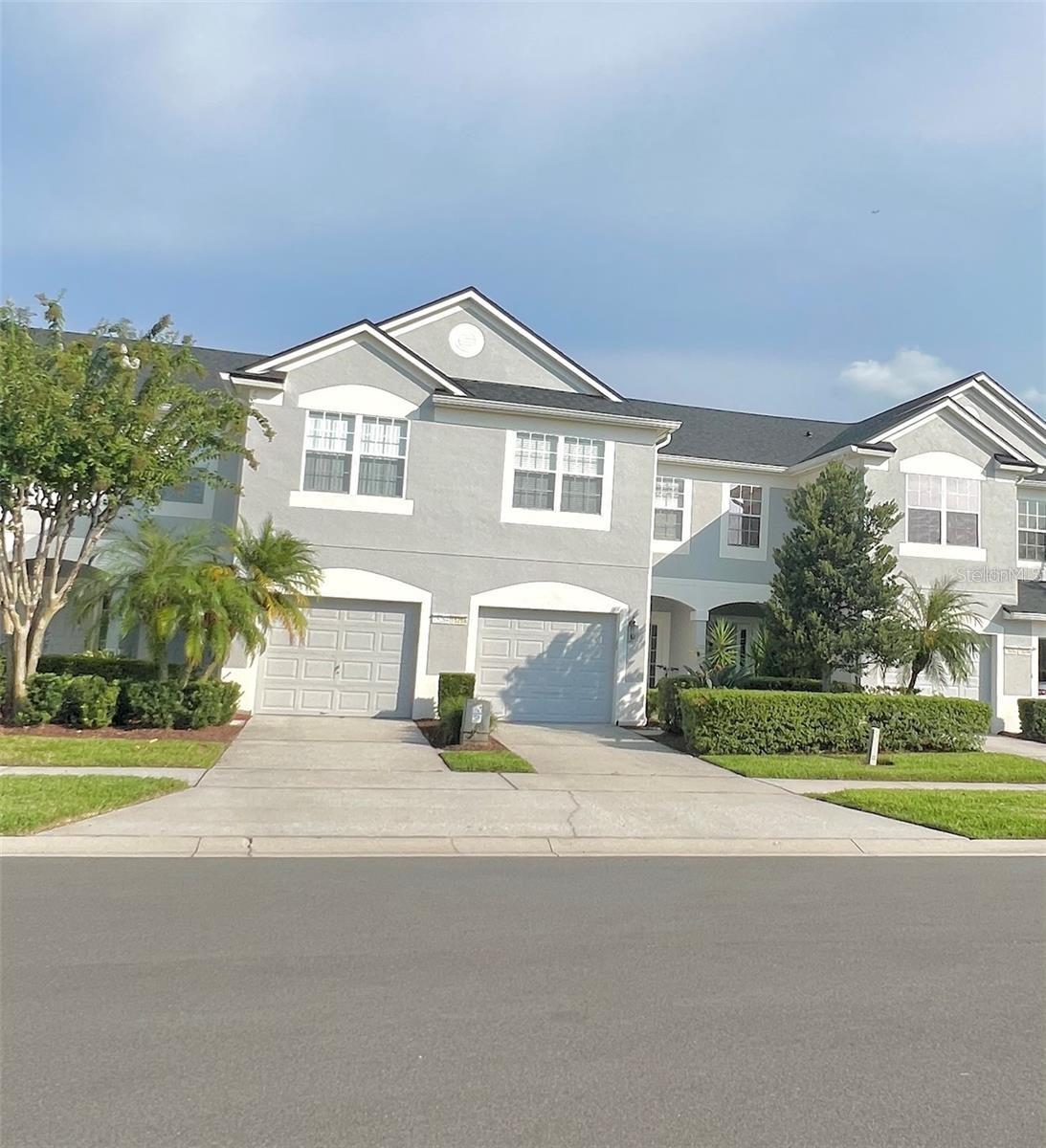 VACANT! This Beautiful 3BR 2.5BA townhouse is in SPRING ISLE!!! This home is in a gated community and is most definitely a must see! The kitchen has 42" cabinets, pantry, eat in space and is open to a large living room/dining room combo with gorgeous ceramic tile floors. Covered and screen in porch off the family room. All bedrooms upstairs including master bedroom with a shower tub and dual sinks in master bath, with plenty of counter space. Single car garage attached, washer and dryer included in upstairs laundry room. Spring Isle offers a guardhouse at the entrance with a guard on duty 24 hours a day, a huge swimming pool, playground, and clubhouse. Within minutes of Waterford Lakes or Avalon Park shopping and dining. This wonderful community is currently zoned for some of East Orlando's most desired schools. *HOA approval/application and fee required. - please see realtor remarks