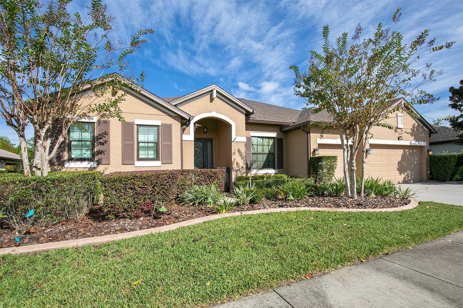 Gorgeous 4 bedroom 3 bath SMART HOME with Movie theater Room & additional office space at the desirable "Enclave at Tuscany" in the heart of Lake Mary is now ready for your family! So many added features are included in this Single Story 3-way split plan home. Upon entry, discover the movie theater room with a 120" movie screen with two 18" subwoofers on your right.  Continuing through the home is the spacious dining area leading to the kitchen, nook, and family area. The Kitchen is perfect for entertaining and cooking appointed with granite counter tops, an over six foot long island with seating area, 42-in cabinets, high end stainless steel appliances, and a large walk-in pantry. The water filtration and softener system in addition to washer and dryer is also included.  The Breakfast Nook has a wonderful built-in bench seating with lots of added storage! Open concept kitchen, nook, and living room leads to the additional Office/Flex space next to the 4th bedroom and full pool bath. French doors from the Living Room or Primary Bedroom take you to the covered Lanai to relax in your huge luxury jacuzzi next to your private, state of the art heated salt-water pool with waterfalls that can be controlled by your smart phone or Ipad (on the wall in the home). Your own private oasis. The Primary Bedroom Suite has hard wood floors and has an impressive 14' long Closet with built-ins from Closet Design which can be accessed from both the bedroom and bathroom. Step into your own retreat in this thoughtfully planned Master Bath, which boasts an oversized Step-in Shower with dual Rain Shower heads, Garden Tub and Dual Vanities with Granite Counter tops. Additional features include
Bowers & Wilkins speakers installed in whole home including the 3-car garage, Ethernet pre-wired throughout the home, and Argon gas filled low E/Vinyl Energy efficient noise reducing windows. ROOF 2020.  Three car Garage has additional overhead storage racks.  Conveniently located minutes from I-4, 417, Cross Seminole Trail, parks, golf courses, Lake Mary’s Colonial Town Center, the mall,  movie theaters, Wonderful Restaurants, Shopping and A rated Seminole County Schools! Come visit this home and fall in love!