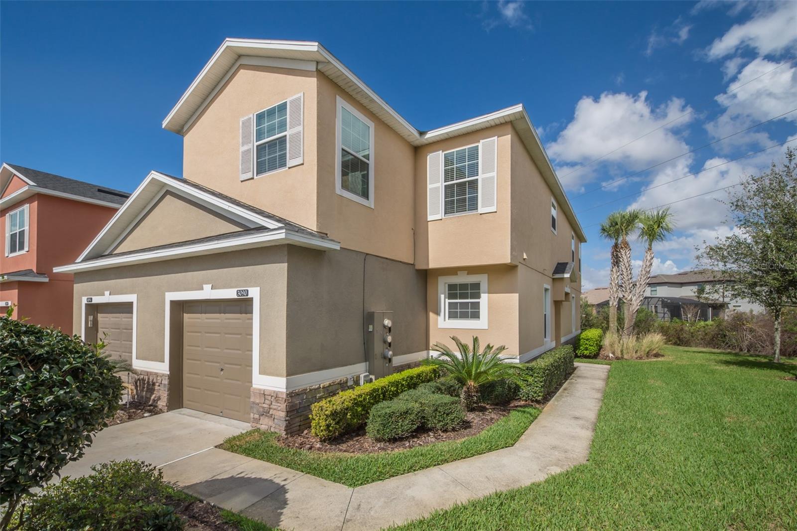 Welcome home to this beautifully maintained 3-bedroom, 2.5-bath corner-unit townhome with a one-car garage, located just minutes from Lake Nona, Medical City, Orlando International Airport, and major highways. Freshly painted and move-in ready, this home features an open-concept floor plan with durable laminate flooring throughout the main living areas. The spacious kitchen is equipped with granite countertops, stainless steel appliances, ample cabinetry, and a breakfast bar overlooking the dining and living areas. Upstairs, you'll find a generously sized primary suite along with two additional bedrooms. Step outside to enjoy the private screened-in patio with no rear neighbors, providing the perfect space to relax and unwind. Residents enjoy outstanding community amenities, including a resort-style pool, fitness center, playground, tennis courts, and basketball courts. Rent includes basic cable, internet, and lawn maintenance.