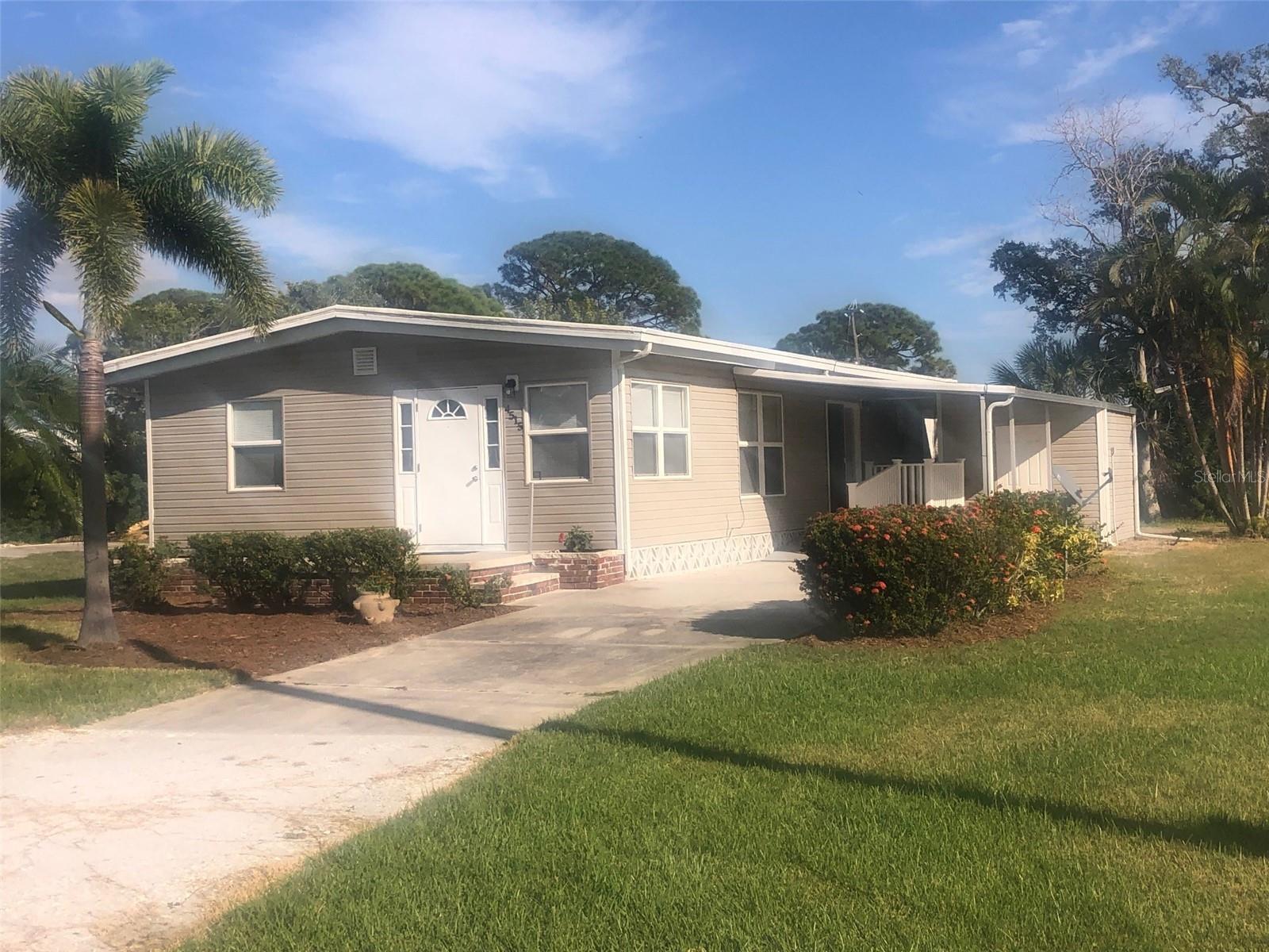 Living the dream is easy in this spacious and updated open floor plan 3 bed 2 bath home.  This neighborhood sits on Sarasota Bay and is just 2.2 miles to the sandy beaches of Anna Maria Island. Scenic views from a nicely landscaped yard with a patio.  A newly constructed and privately deeded boat ramp and dock are at the end of the street.  The are no age restrictions and no HOA.  The floors, cabinets, quartz counter tops and all appliances are all new.  Two furnished bedrooms, living room and dining table included.  The kitchen is completely stocked with glass and dishware, some small appliances, pots and pans, utensils and silverware.  The third bedroom is unfurnished. This is your opportunity to own the perfect Florida home or investment property.