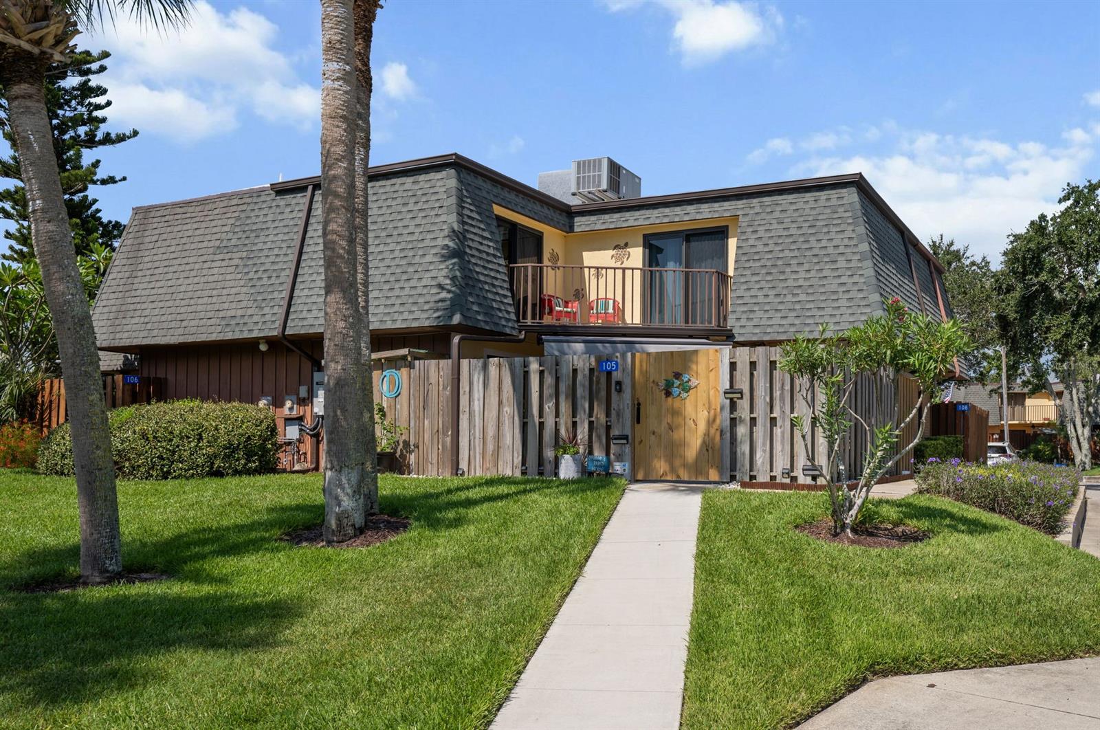 FULLY RENOVATED NSB TOWNHOME ONLY 2 BLOCKS TO THE 27TH STREET RAMP AND NO DRIVE BEACH! MOVE IN READY 2 BED 2.5 BATH Townhome is truly turn-key in LOW HOA $130 Month community of Cedar Dunes. Relax in the courtyard with a huge wind-smart automatic awning, resurfaced patio deck, two new ceiling fans, new fence with anew sidewalk leading to an extra wide gate that locks for security.  Four NEW high-impact hurricane sliders and a whole house Generac Generator that is natural gas makes for worry-free living at the beach.  Step into the stunning kitchen with 42" soft close wood cabinets, slide out drawers, pantry, under cabinet lighting, all new stainless steel appliances including gas range with double oven, new BOSCH dishwasher, Reverse Osmosis Water Tank at kitchen sink, large center butcher block island and Quartz countertops.  The convenient downstairs half bath and laundry has new 2023 full size washer and dryer with extended warranty.  The upgraded cable and powder coated stair rail adds a nautical look with new hardwood on the steps. The master ensuite has an expanded shower, new tile, new cabinetry with a huge custom design walk-in closet.  Step out on the balcony from either bedroom and feel the ocean breeze and enjoy the mature landscaping.  Recent upgrades:  Kitchen cabinets 2022, Generac Generator 2021, new tile, new carpet in bedrooms, all new trim and interior doors, knockdown ceilings, window shades on downstairs sliders, replaced roof shingles, resurfaced flat roof, added gutters with guards, replaced AC 2017 with David Brothers maintenance agreement. Bring your bikes, kayaks,   surf boards and toys with extra covered storage in the courtyard.  All information deemed to be accurate but must be verified by buyer.