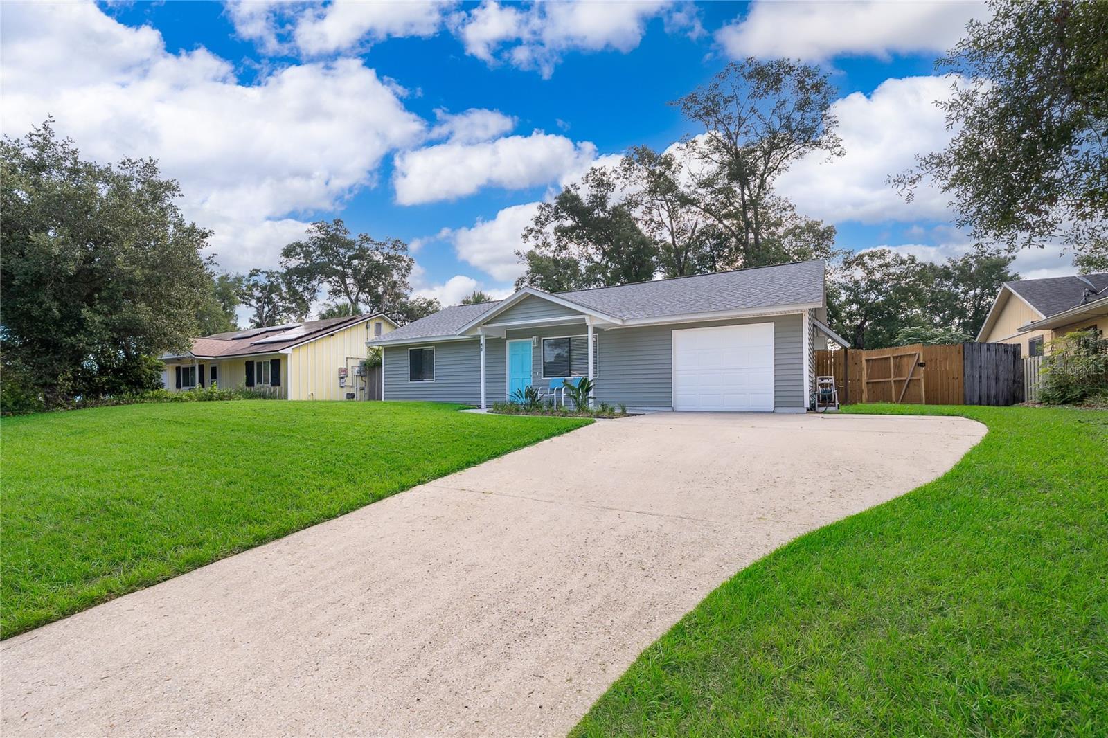 NO HOA! Welcome to your Florida retreat, where comfort, versatility, and recent upgrades come together in this beautifully maintained 2-bedroom, 2-bathroom home.
Step inside to a bright, inviting open floor plan featuring beautiful tile throughout the main living areas and a well-appointed kitchen with stainless steel appliances. A separate laundry area includes the washer and dryer, both of which convey with the home. Fresh interior paint throughout—including all walls and trim—gives the home a clean, modern feel, while bidets have been added to both bathrooms for extra comfort.
A standout feature is the spacious bonus room, offering endless possibilities as a media room, game room, family room, or flex space. This impressive area includes a 100-inch smart projector, surround sound system, and brand-new LED lighting. All entertainment equipment in the bonus room conveys with the sale. The converted garage provides additional living space and can easily be converted back to a traditional garage if desired.
Step outside and enjoy your private backyard oasis featuring a large, fully fenced yard with an above-ground pool and spacious wood deck—perfect for entertaining, relaxing, or hosting family and friends. Need additional space? The property also includes a custom-built, air-conditioned shed that is ideal as a workshop, hobby room, home office, or additional storage, along with a second storage shed for even more convenience.
Major improvements provide peace of mind, including a new A/C (2025), roof (2023), and septic system (2026) with a transferable warranty and two years of prepaid maintenance. New sod in the front and side yards enhances the home's curb appeal.
This move-in-ready property offers flexibility, functionality, and exceptional value—all with NO HOA. Don't miss your opportunity to make this unique home yours. Schedule your private showing today before it's gone!
