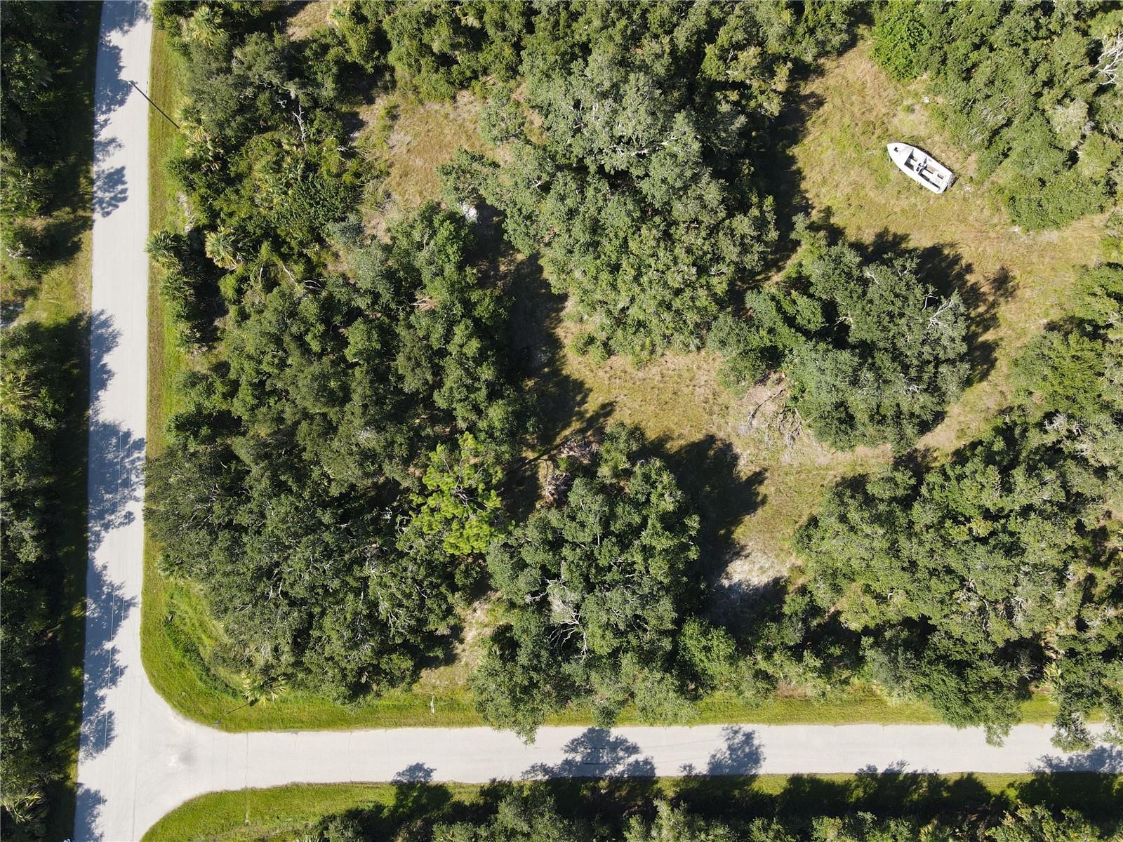 **Back on the market because the buyer decided YOU should buy this lot instead!!** Your Corner Slice of Paradise --> Ready to Develop!  Don’t miss this incredible opportunity to own a vacant corner lot in one of North Port’s most peaceful and private settings. Sitting at just over 0.28 acres (12,232 SF), this beautiful canvas is ready for your vision - whether that’s a custom dream home or a smart investment in residential land. No HOAs. No Deed Restrictions. No CDDs. Build on your terms, your timeline, and your budget. The lot is also confirmed NOT on the North Port Scrub Jay list as of 04/11/2022 (see attached map for details). For those ready to break ground, the property offers easy access to electric lines along the west side, making utility connection straightforward and cost-effective from the start. Nestled in a quiet, low-traffic neighborhood, you’ll still enjoy outstanding convenience: Near I-75, multiple parks schools, and shopping • 20 minutes to Punta Gorda • 30 minutes to Sarasota • 35 minutes to multiple Gulf beaches • 1 hour to Tampa • 1.5 hours to Naples. This lot is an exceptional fit for homebuilders and savvy investors alike - including those leveraging 401Ks, investment portfolios, 1031 Tax-Deferred Exchanges, or self-directed IRAs. Opportunities like this don’t last long in North Port. Secure your slice of paradise today!