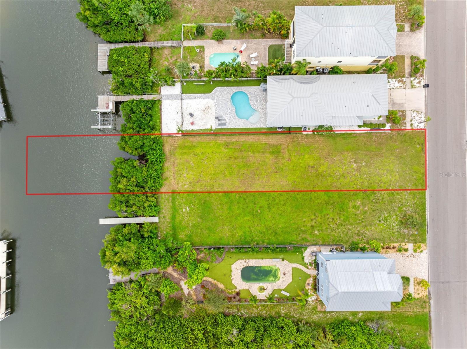 Perfect time to pick up this beautiful lot situated in Apollo Beach with easy water access into Tampa Bay. This lot is 41x133 and surrounded by multi-million dollar properties without an HOA, CDDs or RESTRICTIONS so you can build as you wish. Renderings shown of proposed build are for illustration purposed and plans are available. Enjoy 5-star waterfront dining at nearby restaurants, take a stroll to Apollo Beach Nature Preserve, visit the new sports plex or enjoy shopping at the Yard and much more. Conveniently located near US 41 and I-75, easy commute to Tampa, Orlando, St. Pete, Clearwater, beaches and parks! Go view it today!