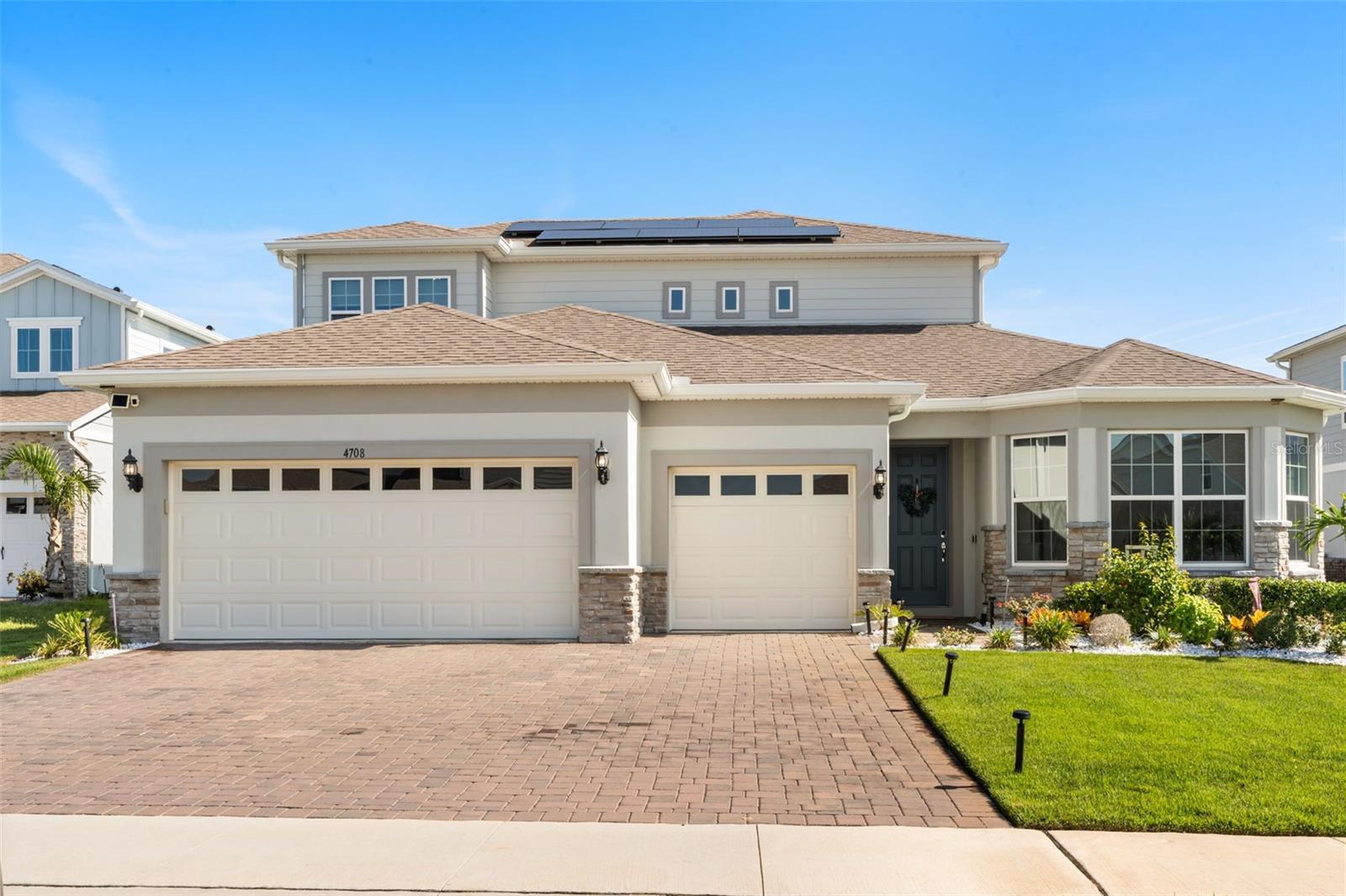 Welcome to this beautifully appointed residence in Estates at Lakeview Preserve. Situated on an oversized homesite within this gated Winter Garden community, this exceptional home showcases over $100,000 in owner-added custom upgrades in addition to premium builder selections. Thoughtfully designed and meticulously maintained, it offers an incredible combination of luxury finishes, modern convenience, and resort-style outdoor living that's ready to be enjoyed from day one.
Designed with both everyday living and entertaining in mind, the spacious open floor plan features a first-floor owner's suite, generously sized secondary bedrooms, a private flex room ideal for a home office, an oversized upstairs loft with an additional guest suite and full bath, and a four-car garage with included electric vehicle chargers.
The heart of the home is the beautifully designed kitchen, complete with quartz countertops, premium cabinetry, abundant workspace, and an open layout that flows seamlessly into the main living area and covered lanai. Throughout the home you'll find custom built-in cabinetry, professionally designed closet systems, and motorized window treatments that add both style and functionality.
The backyard was designed to be enjoyed year-round. Relax by the heated pool, entertain from the fully equipped summer kitchen, enjoy your favorite music through the built-in surround sound system, or take advantage of the convenient cabana bath after a day outdoors. Every space was thoughtfully designed to make Florida living as enjoyable as possible.
This home is equally impressive behind the walls, featuring an owned solar panel system, whole-home CAT6 networking, enhanced Wi-Fi, smart TV connections, integrated surround sound, security and camera prewiring, and numerous smart-home features that provide modern convenience and energy efficiency.
Living in Estates at Lakeview Preserve means enjoying gated access and outstanding community amenities including a resort-style pool, clubhouse, fitness center, playground, scenic walking trails, and beautiful lake views. Conveniently located just minutes from SR-429, Winter Garden Village, Walt Disney World, shopping, dining, and highly rated schools, the location is just as impressive as the home itself.
From the extensive custom upgrades to the exceptional attention to detail, this home has been lovingly maintained and thoughtfully improved throughout. Opportunities to own a property finished to this level are few and far between. Schedule your private showing today.