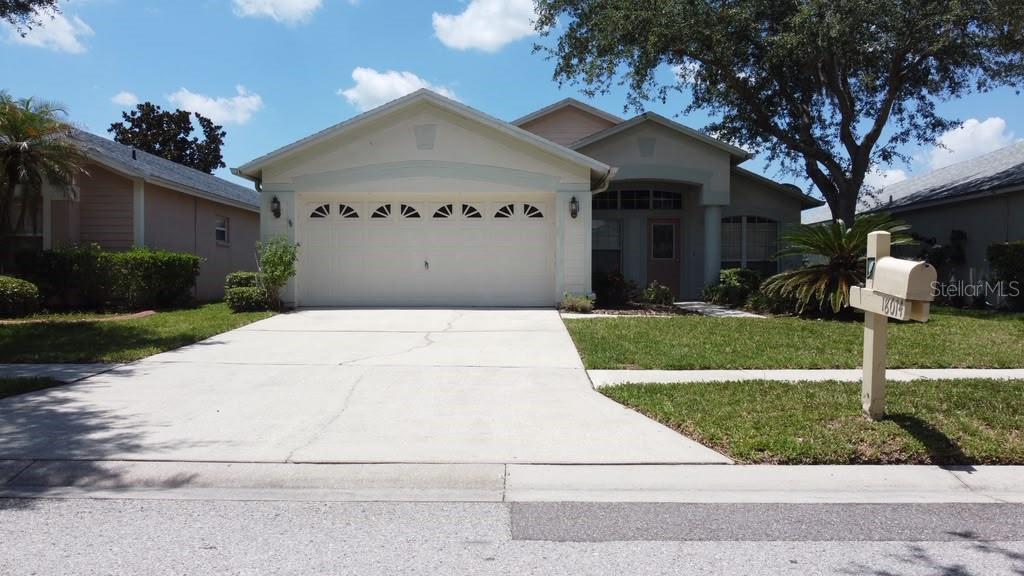 Welcome to the highly sought after Arbor Greene community. Arbor Greene is a 24-hour guard gated community, offering resort type amenities (2 pools, fitness center, tennis courts, pickle ball courts, and so much more) along with top rated schools. Tucked away in this community you will find this spacious 4-bedroom home backed up to conservation for ultimate privacy. This home has immense potential to become your dream residence! Priced to sell, this property boasts, a sprawling screened in lanai area and a desirable waterfront homesite. Inside, you'll find a spacious family room, formal room with dining room and split floor plan. Water heater and range are gas.
