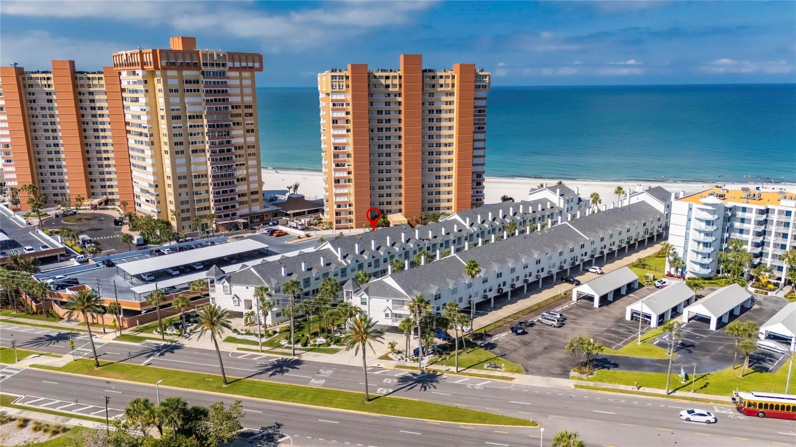 Sunset Reef - A Direct Gulf Front Community with just 50 units right on the white sandy beaches of Redington Shores! Amenities include heated pool, courtyard and picnic area, gated entrance to the beach. Main features of this unit include a spacious layout, balconies off the family room and owner’s suite, fireplace, indoor laundry, 1 Car Garage and 1 assigned parking space as well as guest parking. The First Level includes the 1 Car Garage, storage and direct access to the pool and beach. Second Floor includes kitchen, living area, dining room, powder room, fireplace and French doors that open to the balcony. Third floor includes Primary bedroom with en-suite bathroom, guest bedroom with en-suite bathroom that also has a second door leading to the hallway, laundry closet and another balcony! LPV flooring on 2nd floor, Upgraded kitchen with white cabinets, granite counters and stainless steel appliances. Truly Turnkey! Live here Full-time and enjoy beautiful sunsets and walks on the beach or use as an investment property (30 day minimum rental). Walking distance to stores and several restaurants. Redington Shores is quaint beach community close to shopping, boating, fishing, restaurants, Bird Sanctuary and parks. 30-45 minutes to professional sports, downtown St Pete and Tampa International Airport. Pets OK (1 up to 20lbs). HOA Fee Includes Building Insurance, Flood Insurance, Cable TV, Heated Community Pool, Escrow Reserves Fund, Internet, Maintenance Exterior, Maintenance Grounds, Pool Maintenance, Sewer, Trash & Water. New roof in 2024, Building painted in 2025.