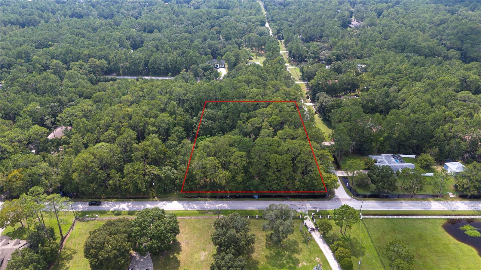 1 Acre Lot in Quail Hollow – Predominantly Wetlands. Located in the Quail Hollow area of Wesley Chapel, this 1-acre parcel offers a natural setting surrounded by Florida’s native landscape. Approximately 98% of the property is classified as Wetlands Category 1, which significantly limits the potential for development under current environmental regulations. Buyers are strongly encouraged to perform their own due diligence with Pasco County and applicable environmental agencies regarding land use, permitting, mitigation requirements, and any potential development feasibility.