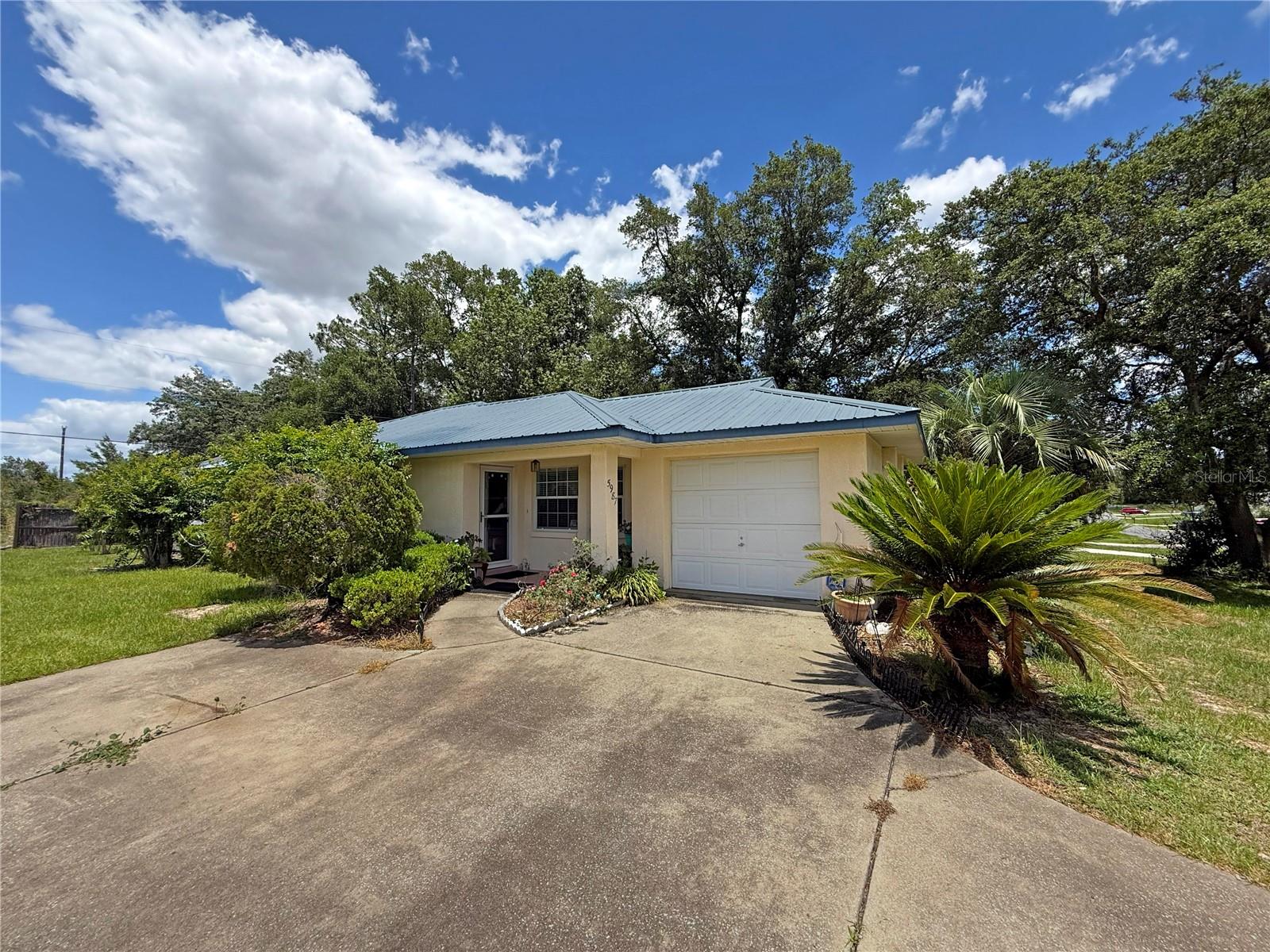 SW OCALA POOL HOME FOR UNDER $210K! This 2-bedroom, 2-bath CBS home offers nearly 1,100 living square feet and is situated on a 0.23-acre lot. Interior features include large master bedroom, laminate flooring throughout the main living areas, vinyl flooring in the bathrooms, a 1-car side-load garage. Exterior features metal roof, storage shed, and a screen-enclosed in-ground pool.  While the home has been well maintained, it could benefit from some updating with modern finishes, making it an excellent opportunity for buyers looking to add their personal touches and build equity. Conveniently located near shopping, dining, and everyday amenities. New Publix and Walmart being built just minutes away.