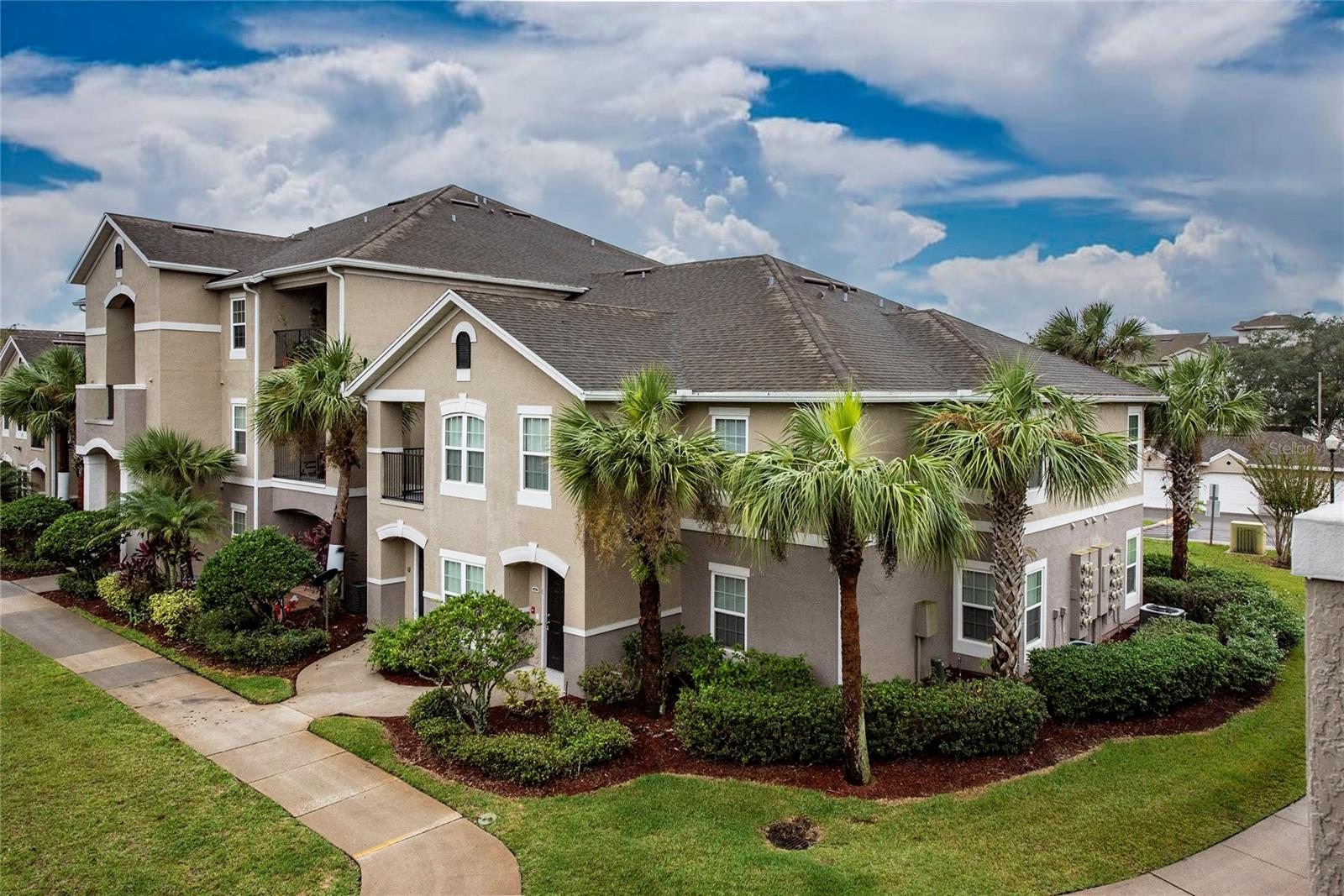 Welcome to this spacious second-floor condominium located in the highly desirable gated community of Courtney Landing, just off Lee Vista Boulevard and directly across from Lee Vista Promenade, offering convenient access to shopping, dining, grocery stores, and everyday essentials. Ideally situated just minutes from Orlando International Airport, SR 528, SR 417, Lake Nona, and Downtown Orlando.

This well-maintained residence features a modern gray color palette, laminate wood flooring throughout the living areas and bedrooms, high ceilings, and an open-concept layout that creates a bright and inviting living space.

The kitchen is fully equipped with ample cabinetry and a breakfast bar overlooking the living and dining areas, making it perfect for everyday living and entertaining. The spacious primary suite offers a large walk-in closet, private bathroom, and direct access to the screened balcony. Two additional bedrooms also feature walk-in closets, providing generous storage throughout the home. A dedicated laundry area is conveniently located adjacent to the kitchen.

Water and trash service are included in the rent, providing added value and convenience.

Residents of Courtney Landing enjoy access to a variety of community amenities, including a gated entrance, resort-style swimming pool, fitness center, clubhouse, and beautifully maintained common areas.

Don't miss this opportunity to lease a move-in-ready home in one of Orlando’s most convenient and sought-after locations. Schedule your private showing today.