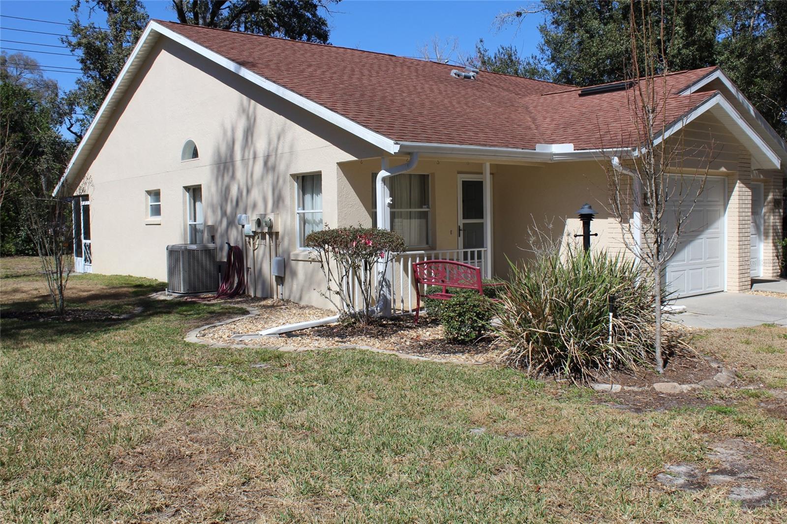 Welcome to this nice maintenance free villa (incl. roof) in THE GLEN, older persons community where you never need to be lonely; very friendly home owners.
This condo is well cared for with a newer roof in 2016, new HVAC in March 2025, a garage door replacement in 2016.
The home consists of a good sized living room, a kitchen with stone counters and quality appliances, a master suite with walk in closet and bathroom en suite with shower . The floors are of quality material ,marble and black granite.
There is an additional guest bedroom and bathroom and walking through a sliding door, a nice screened patio.
The one car garage has a washer and dryer. Great internet as part of monthly fees. 
AND!.. This home is equipped with video surveillance for security!!
One of the many attractions of The Glen is the fact that it is in the Pine Ridge neighborhood of the larger edge of Beverly Hills area  nearest Lecanto .. there is plenty to do...Two adjacent park areas and free tennis courts, wonderful canine amenity and organized activities like the woodworker guild and horseshoe league, Lake Beverly and more..
No need to be bored and making friends will be easy..
Come and have a look and give us a call!!!