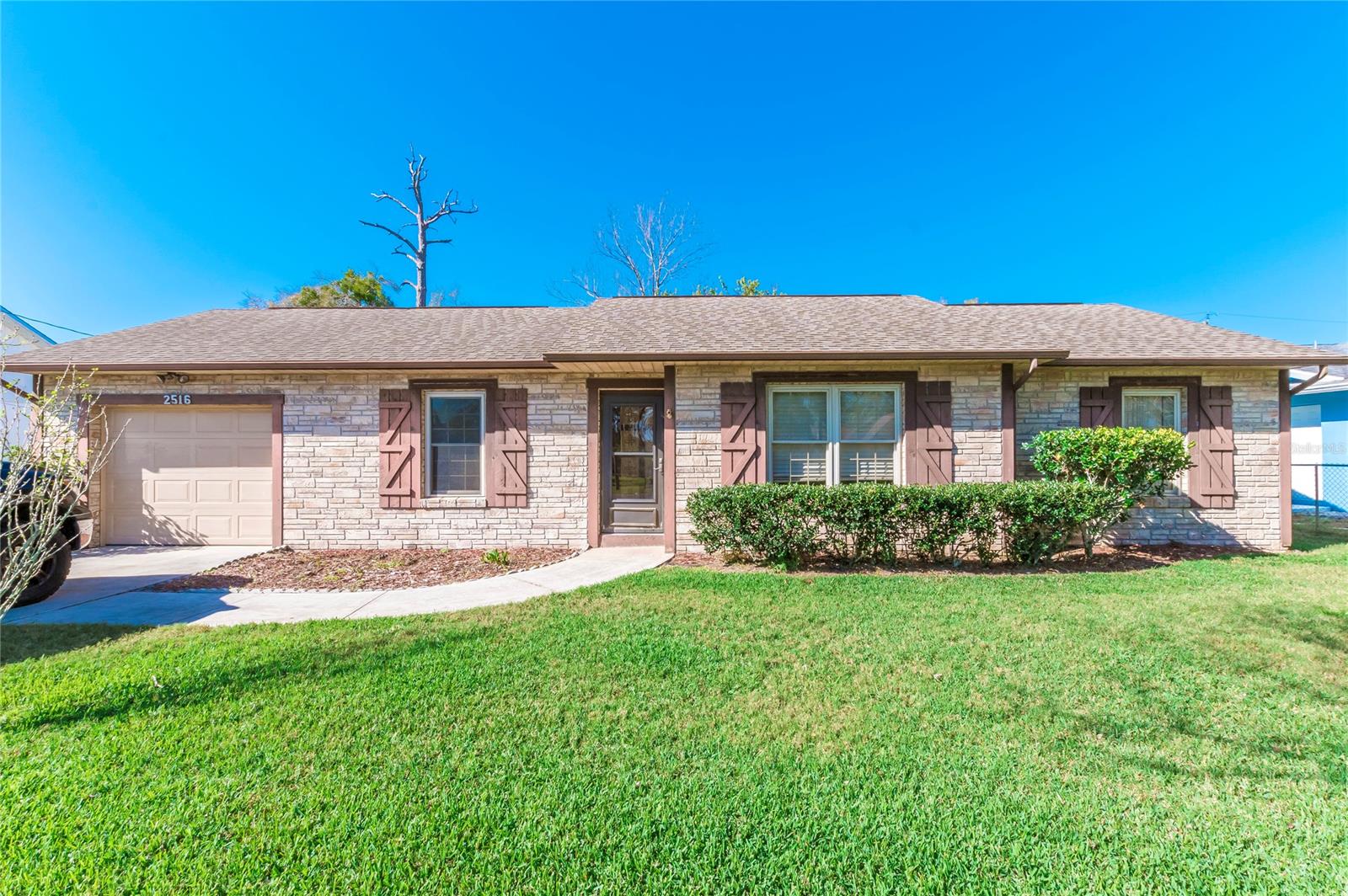 This 3/2 home with 1 car garage features a lovely natural light through out, split floor plan with a dining room open to living room, completely fenced in yard (front and back!), with lush green grass and front landscaping that brings curb appeal. The kitchen includes stainless steel appliances, a breakfast nook, and sliding doors leading to the screened in patio AND additional covered patio. The backyard includes a large shed (with electricity!) for all your tool/equipment storage needs and a natural gas hookup for generator. Great location, close to boat launch or walk to the park on Turnbull Bay. Schedule an appointment to view this home today! ;Water: City