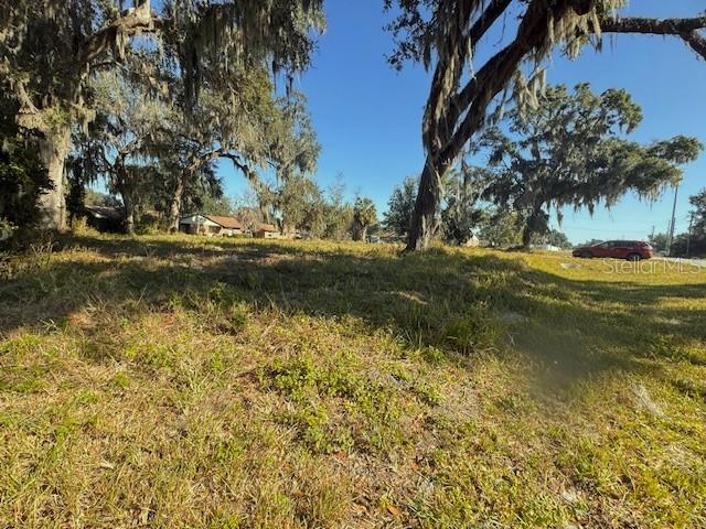 Prime .51-acre residential lot located within the City Limits of Webster, Florida, offering outstanding development potential. The property features approximately 197 feet of frontage along E C 478, providing excellent access and visibility. City water and sewer are available, and a fire hydrant sits on the corner of the lot, adding convenience for future development.

The lot is zoned R-6C, and current zoning regulations allow for the construction of a tri-plex, making this an attractive opportunity for investors or owner-occupants. Build your own income-producing property—live in one unit and rent the other two. The owner already has tri-plex building plans available, saving valuable planning time. Choose your own builder

Several mature trees add natural character to the property while still leaving ample room for construction.

The location blends small-town charm with practical convenience. The lot is less than one mile from Sam S. Morris Memorial Park, which features a pavilion, playground, and the home field for Sumter Little League Softball. Webster is widely known for the Webster Farmers Market—one of the largest in Central Florida, as well as its long-standing weekly cattle auction and rich agricultural heritage.

Despite its peaceful rural setting, Interstate 75 is just minutes away, providing quick access to surrounding cities and employment centers.

Whether you're an investor, builder, or someone looking to create a live-in income property, this property offers excellent potential in a growing Central Florida location. Sellers are Licensed real estate agents in the State of Florida.