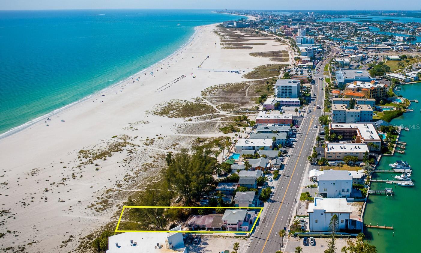 Development Opportunity - Beach Front Parcel!  This exceptional Gulf-front parcel on Treasure Island offers a rare opportunity to develop a premier beachfront property with flexible Resort Facilities High (RFH-50) zoning.  The ±15,777 SF lot provides direct access to sugar-sand beaches along the Gulf of Mexico and promises significant potential across multiple hospitality and residential uses.

The site supports development concepts ranging from a branded boutique hotel or condo-hotel to luxury vacation rental complexes, spec homes, or a mixed-use resort integrating food & beverage with short-term lodging. Positioned within 30 minutes of Tampa International Airport and adjacent to the thriving St. Pete/Clearwater market, this destination benefits from robust tourist demand, with Pinellas County generating $3.1 billion annually in visitor spending and setting record-high tourism tax revenues in 2025.

Treasure Island stands among the nation’s top-rated beach markets, offering an irreplaceable supply-constrained environment that underpins long-term appreciation. Whether designed for hospitality ROI or luxury residential demand, this beachfront development site combines access, visibility, and future-proof value. Currently the property is being operated as a STR.