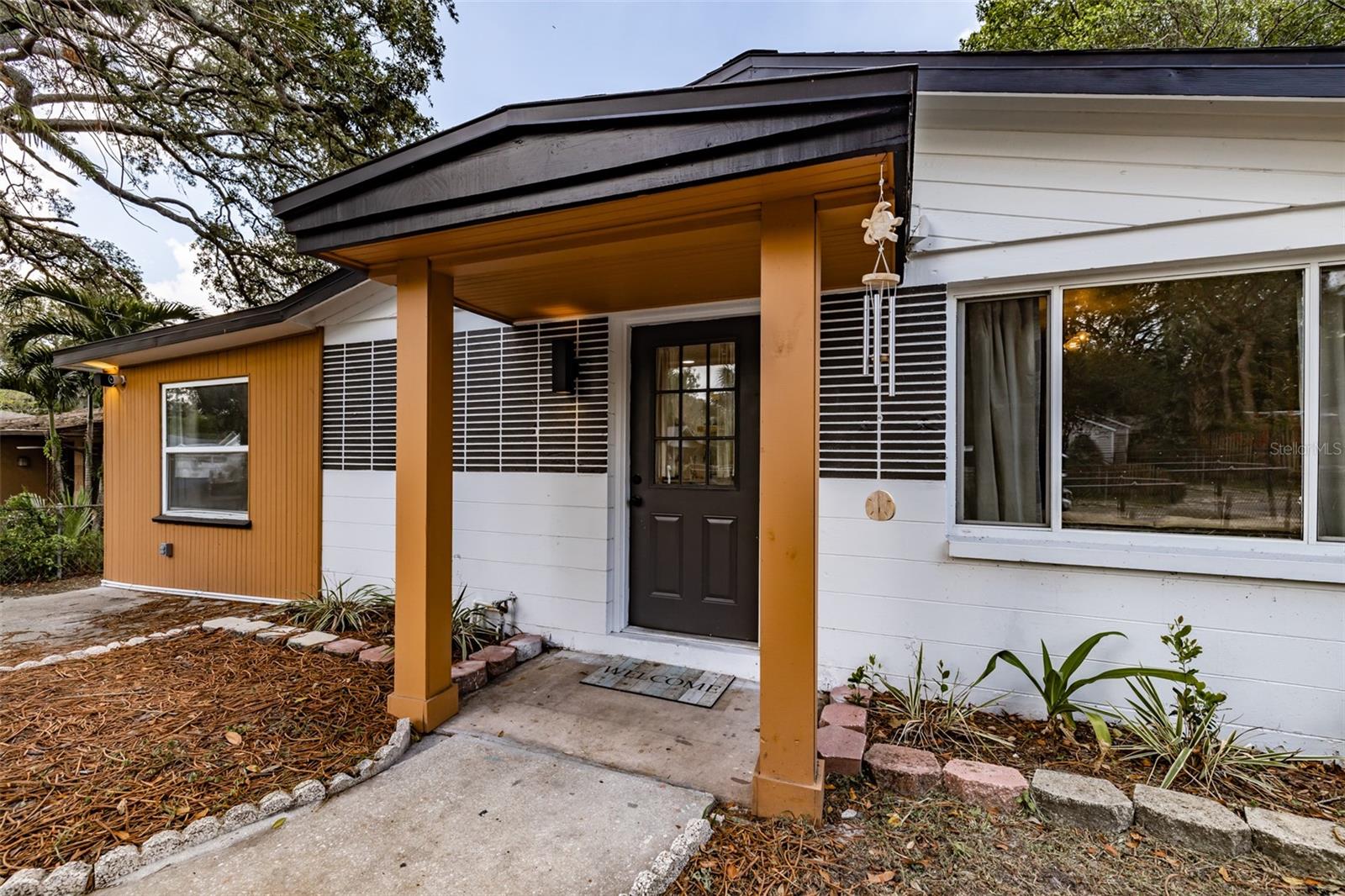 This great 3 bedroom 1 bath home is close to everything only 15 minutes from the downtown Tampa ,10 minutes from Lowry Park Zoo.
modern kitchen for your convivence with a vibrant colors  on the cabinets made this a dream kitchen .spacious and with a lot of natural light.
The bathroom is remodeled with a new vanity , new tile, even the lighting is new . huge back yard for you enjoy the Florida living , relax and do your memories here .