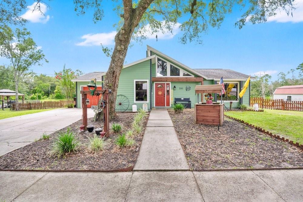 Under contract-accepting backup offers. This is it—your own slice of paradise! Welcome to 390 High Street in Lake Helen, Florida. This charming 3-bedroom, 2-bath farmhouse is picture-perfect, with abundant natural light, an updated kitchen, soaring ceilings, and a spacious deck overlooking the pond—ideal for entertaining. Sitting on nearly 1/3 of an acre with no HOA, there’s plenty of room to bring your toys. Need extra storage? A shed is included on the property. USDA offers 100% financing for qualified buyers. The roof was replaced in 2016, and a survey is available. Zoned for Deland High School—go Bulldogs!