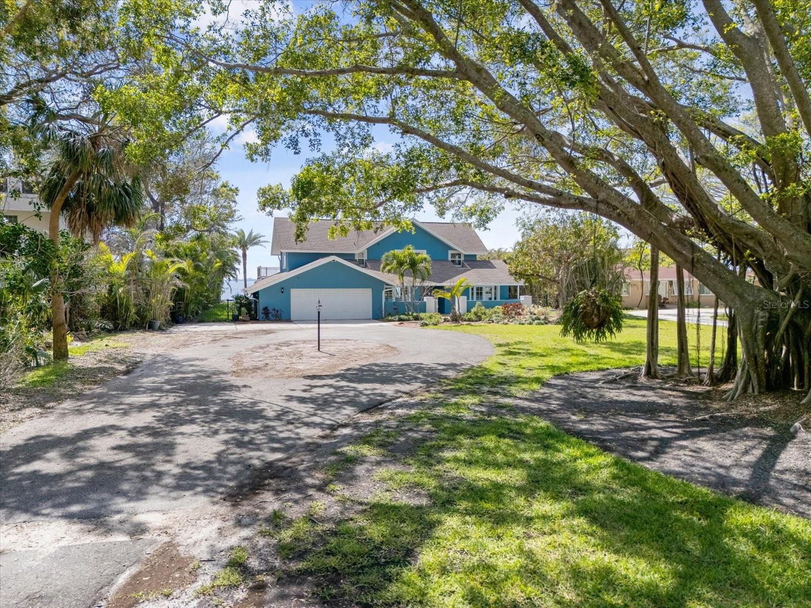 Discover Your Sarasota Waterfront Paradise!
Imagine waking up to the gentle sounds of Sarasota Bay, where your private beach meets 100 feet of pristine shoreline. This enchanting 5-bedroom, 4-full, and 2-half-bath residence masterfully combines timeless charm with modern comforts, creating the ultimate waterfront haven.
For those who cherish life on the water, this property is unparalleled. Nestled on nearly an acre, it boasts an expansive dock equipped with two boat lifts (24,000 lbs and 14,000 lbs capacities), ensuring your vessels are always ready for sun-soaked adventures on Sarasota Bay and beyond.
Step inside to be greeted by vaulted Cypress ceilings and panoramic windows that bathe the home in natural light, offering uninterrupted bay vistas. The first-floor primary suite is a serene retreat, allowing you to awaken to mesmerizing water views. It features a spacious walk-in closet and a luxurious bath with an infinity soaking tub. An additional guest suite and full bath on the main level ensure comfort and privacy for visitors.
Whether hosting intimate dinners or lively celebrations, the home’s thoughtfully designed layout caters to every occasion. Enjoy meals in the formal dining area, relax in the cozy family room, or prepare culinary delights in the well-appointed kitchen with a breakfast bar. The separate living room offers sweeping Sarasota Bay views, perfect for unwinding as boats drift by.
The expansive travertine pool deck invites you to indulge in Florida’s perpetual sunshine. An open-air pool and spa set the stage for memorable day-to-night entertainment.
Upstairs, three additional bedrooms, a loft area, two full baths, and a half bath provide generous space for family and guests, ensuring everyone has their own private sanctuary.
Located in the Whitfield Estates neighborhood, residents have the unique opportunity to enjoy dining at the nearby Sara Bay Country Club. For an optional annual HOA fee of just $35, you can enjoy a culinary membership that grants full access to the clubhouse for dining and social events (golf privileges not included).
Combining classic Florida allure with contemporary updates, this property invites you to experience the relaxed waterfront lifestyle that defines Sarasota. Don’t miss the chance to make this exceptional residence your own.