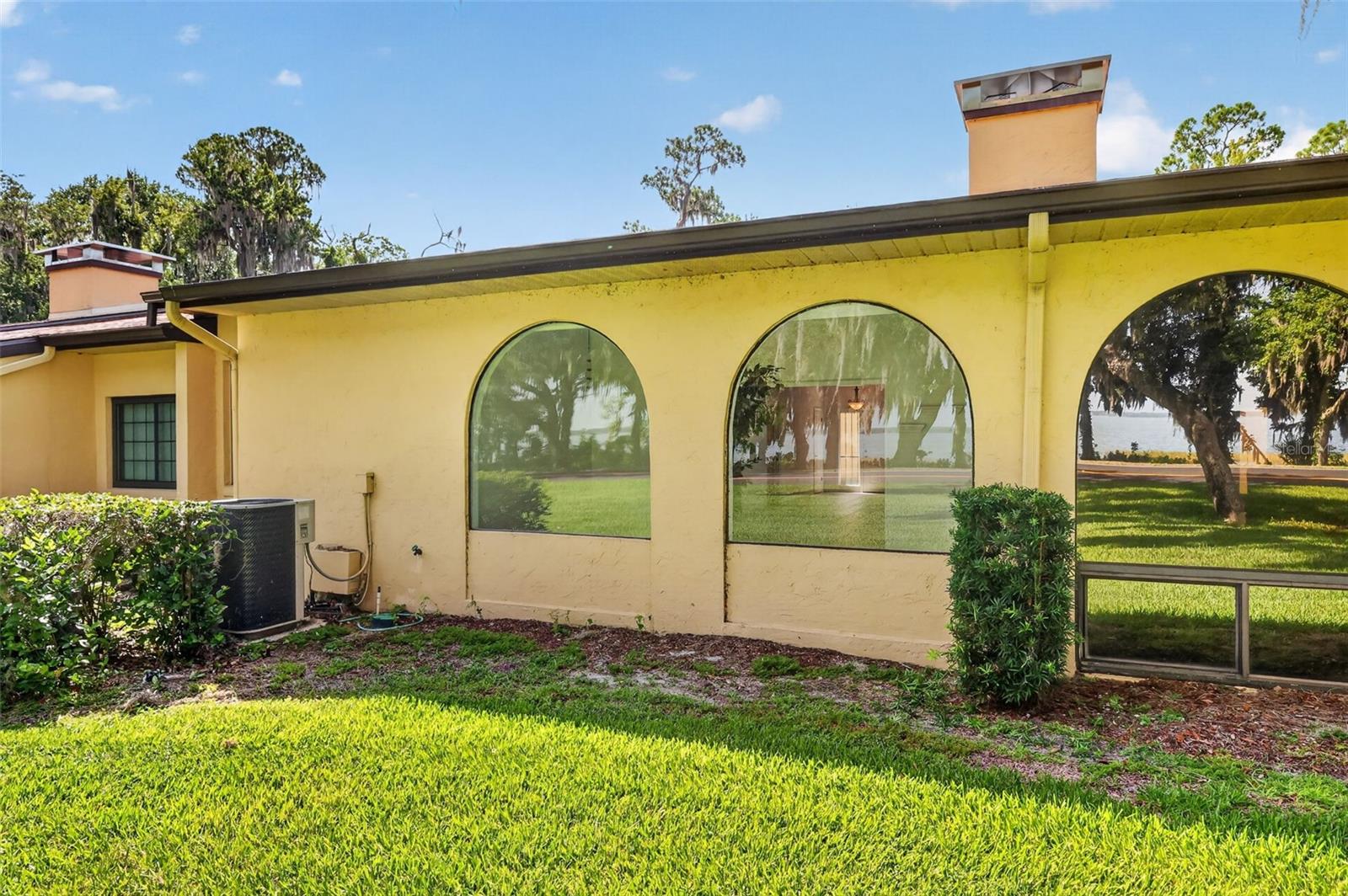 If you're looking for lakefront luxury here it is. Introducing this two bedroom two full bath on beautiful Lake Eustis and it comes with a deeded boat slip and mechanical lift! This condo is located in the desirable condominium of Fair Oaks and if the boat slip and dock isn't enough there is a private pool and clubhouse for Fair Oaks residents only. This spacious home is filled with natural light enhanced by 2 large skylights and offers a warm inviting stone fireplace creating a cozy environment. The oversized garage offers ample room for two cars and other toys should you need the room.
The Harris chain of lakes offers many recreational opportunities and this condo is convenient to all of them. A quick ride through the Dora Canal grants access to Lake Dora and local restaurants in Tavares and Downton Mt Dora.