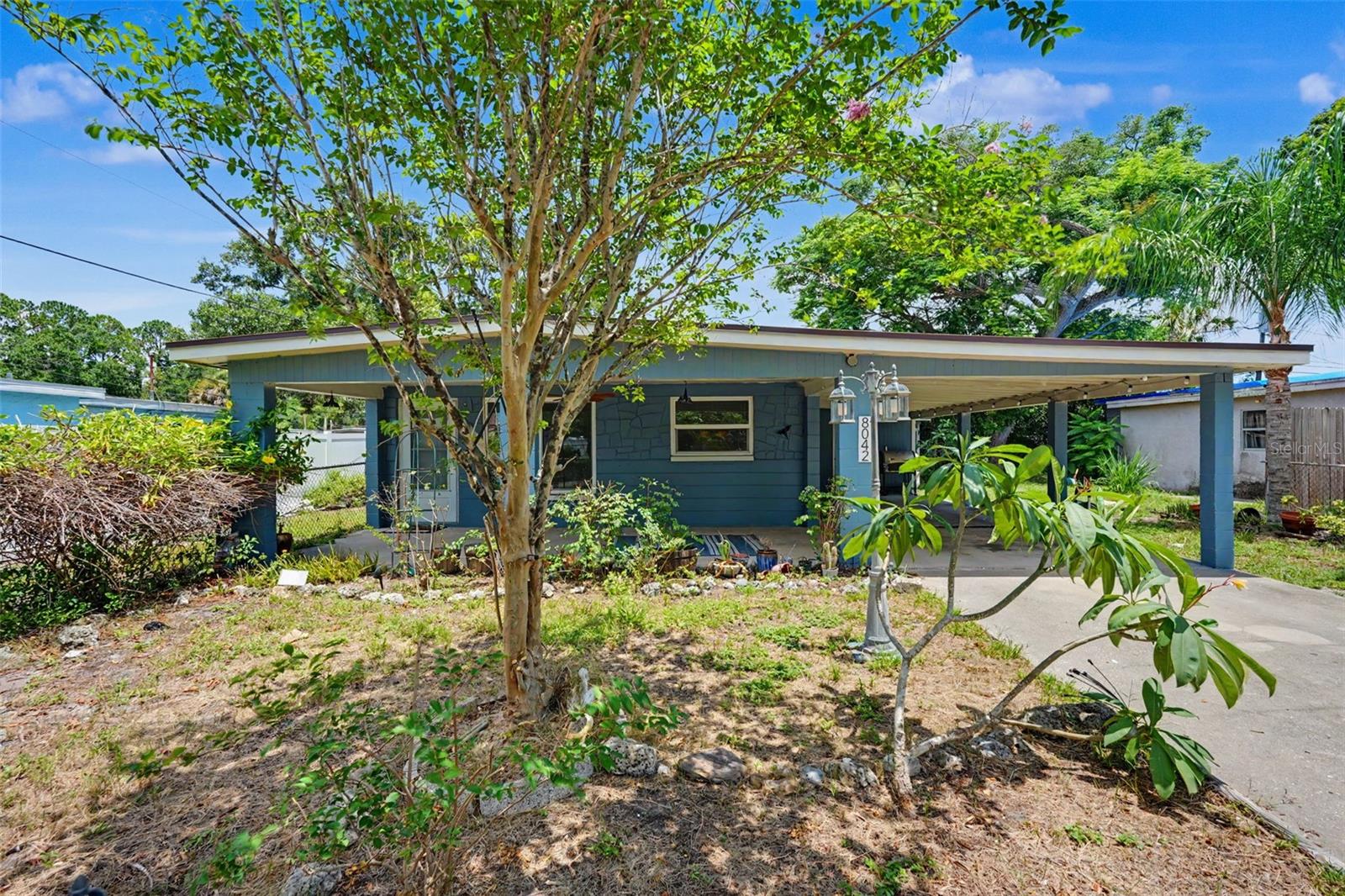 Virtually Staged. Welcome to this beautifully maintained 3-bedroom, 1-bath home located in the heart of Seminole, just 15 minutes from some of Florida's most beautiful Gulf beaches. Situated in a highly desirable neighborhood with no HOA and no flood insurance required, this solid home offers comfort, convenience, and peace of mind. Inside, you'll find three generously sized bedrooms and a recently remodeled bathroom. The spacious eat-in kitchen flows seamlessly into the living room, creating a warm and inviting space for everyday living and entertaining. A large laundry room, accessible through the primary bedroom, provides additional storage and functionality and is not included in the home's heated square footage. This home has been thoughtfully updated with major improvements already completed, including a new roof (2020), new front door (2020), HVAC system (2021), kitchen appliances (2022), water heater (2025), and windows (2019). A Generac whole-house generator and electrical panel were installed in 2018, providing added security and reliability during Florida's storm season. Step outside to enjoy the fully fenced backyard featuring a covered carport and two oversized sheds/workshops, both equipped with electricity—perfect for hobbies, storage, or a home workshop. Conveniently located just minutes from shopping, restaurants, parks, the Bay Pines VA Healthcare System, and the area's world-famous beaches, this move-in-ready home is an outstanding opportunity for first-time buyers, downsizers, or anyone looking to enjoy the best of the Seminole lifestyle.